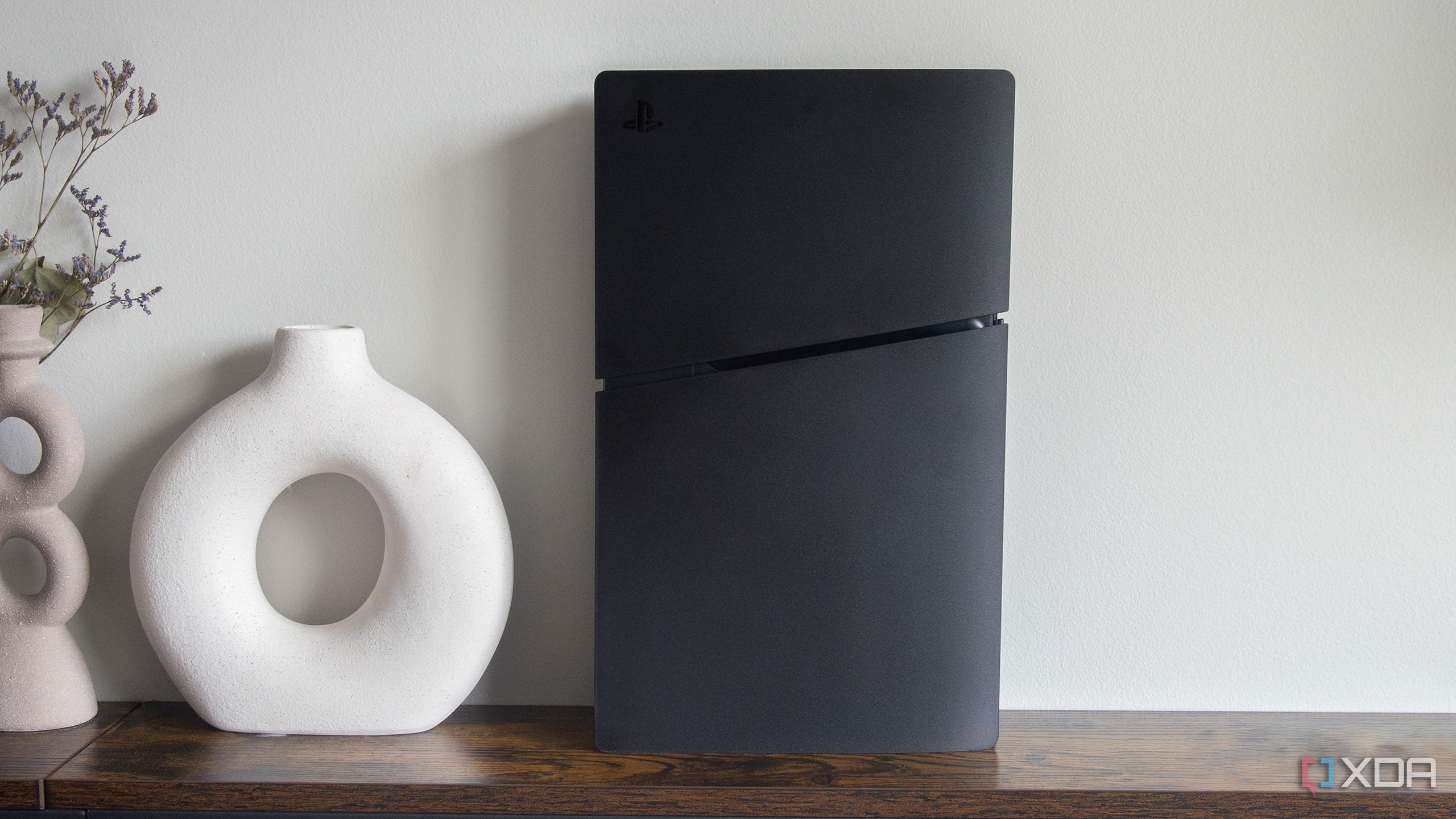 The PlayStation 5 Slim sitting on a table 