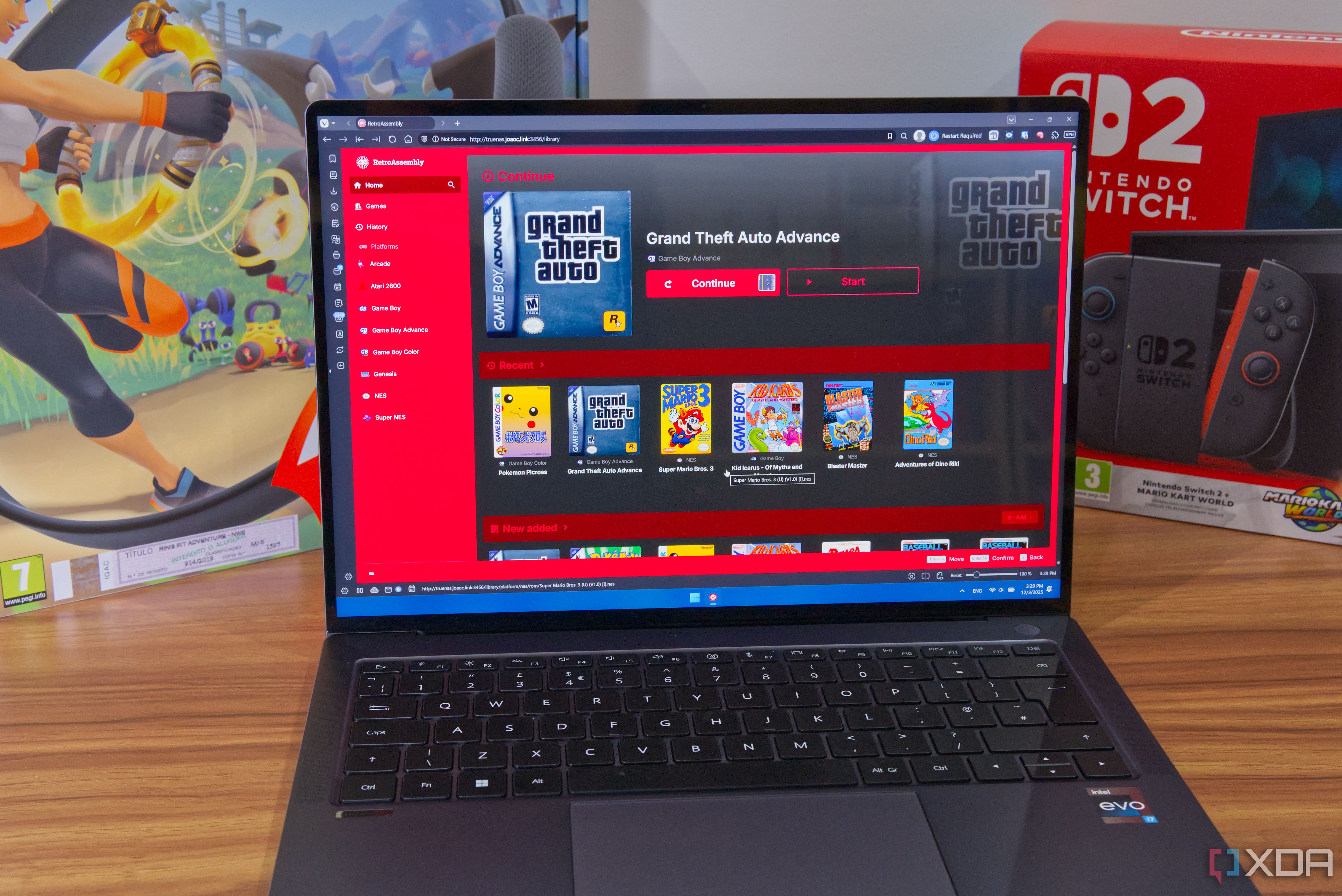 A laptop displayiong the RetroAssembly homepage in a web browser