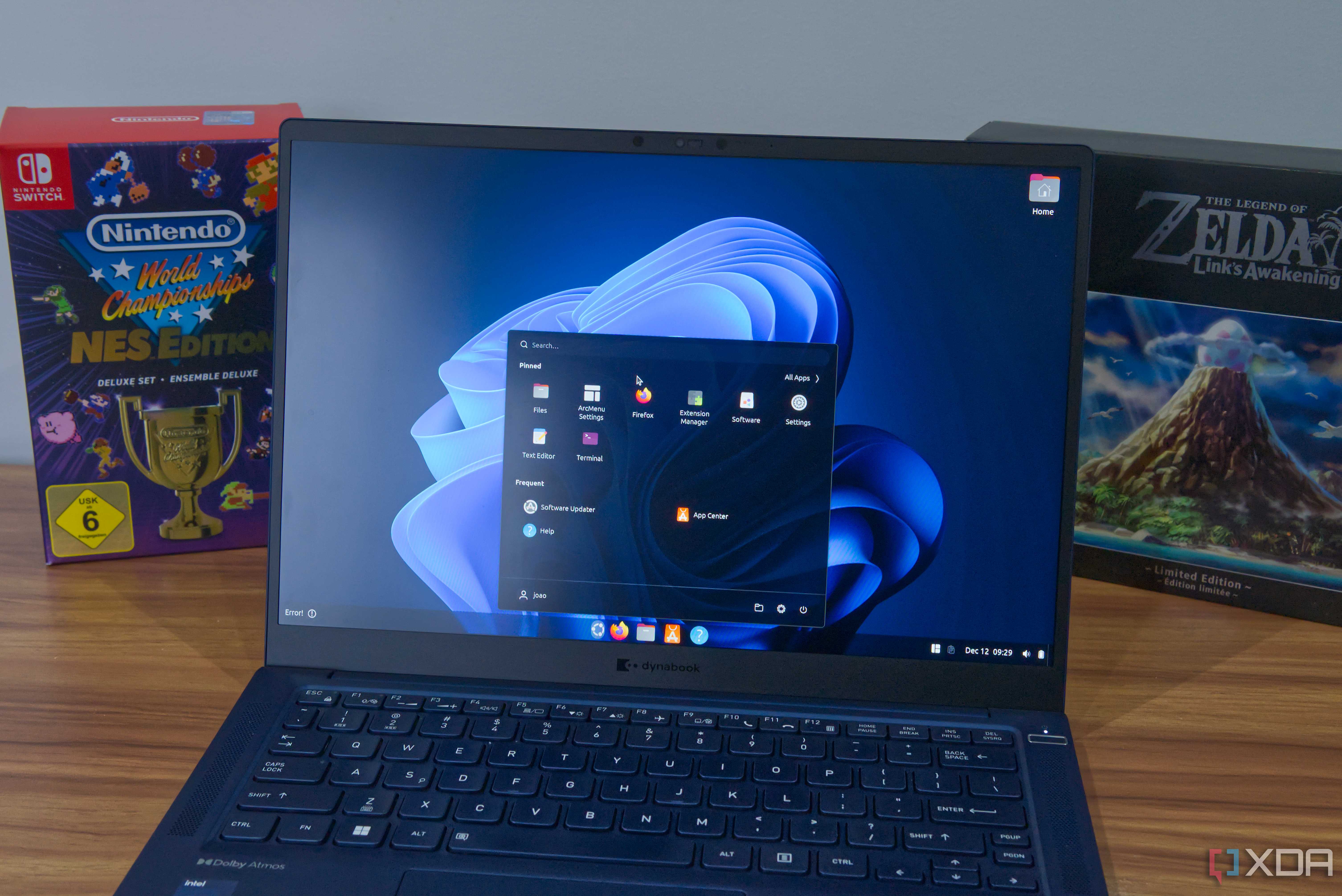 A laptop running Ubuntu with various customizations to make iot more similar to Windows 11