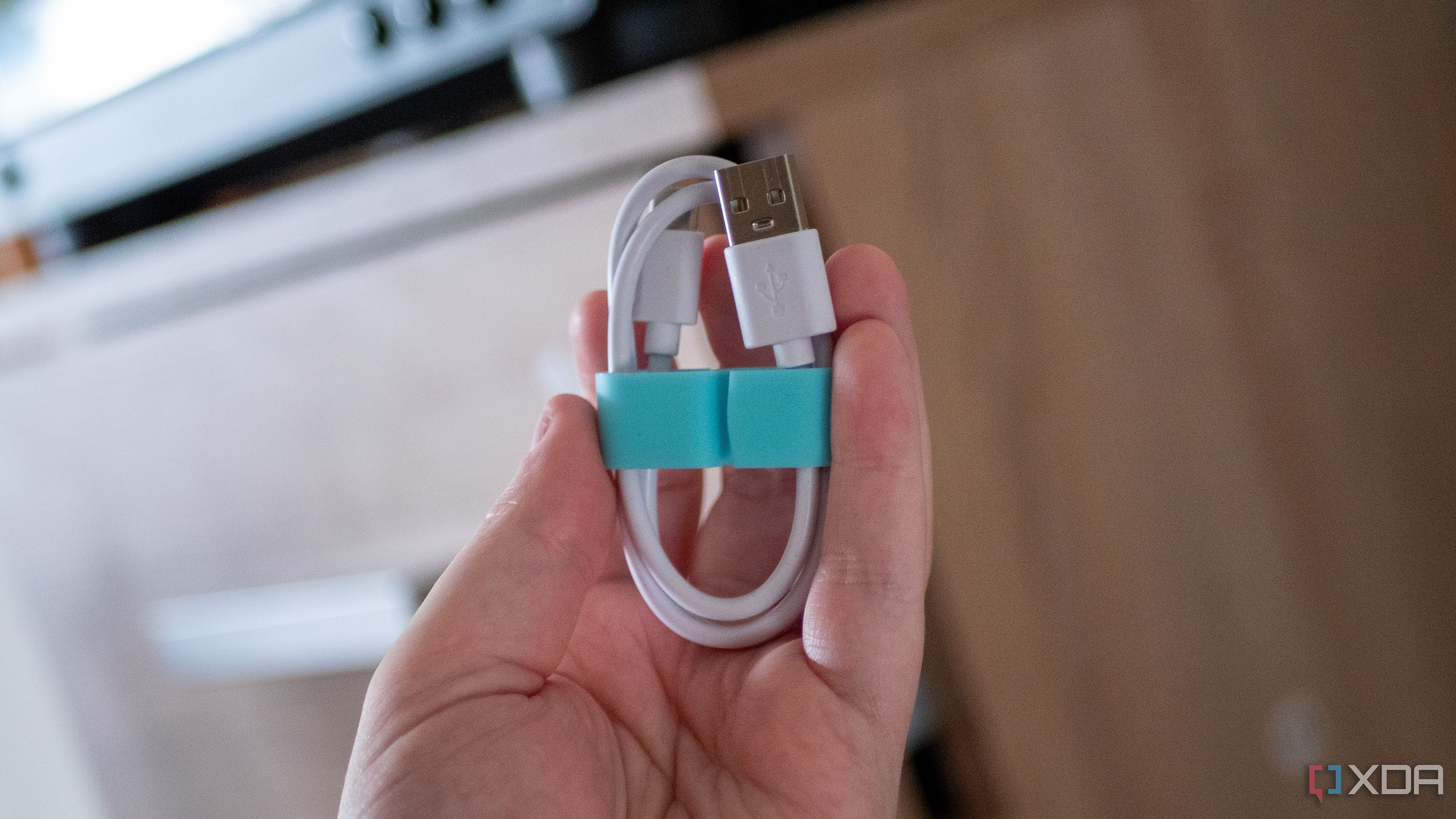 3D printed cable organizer with a cable wrapped inside it