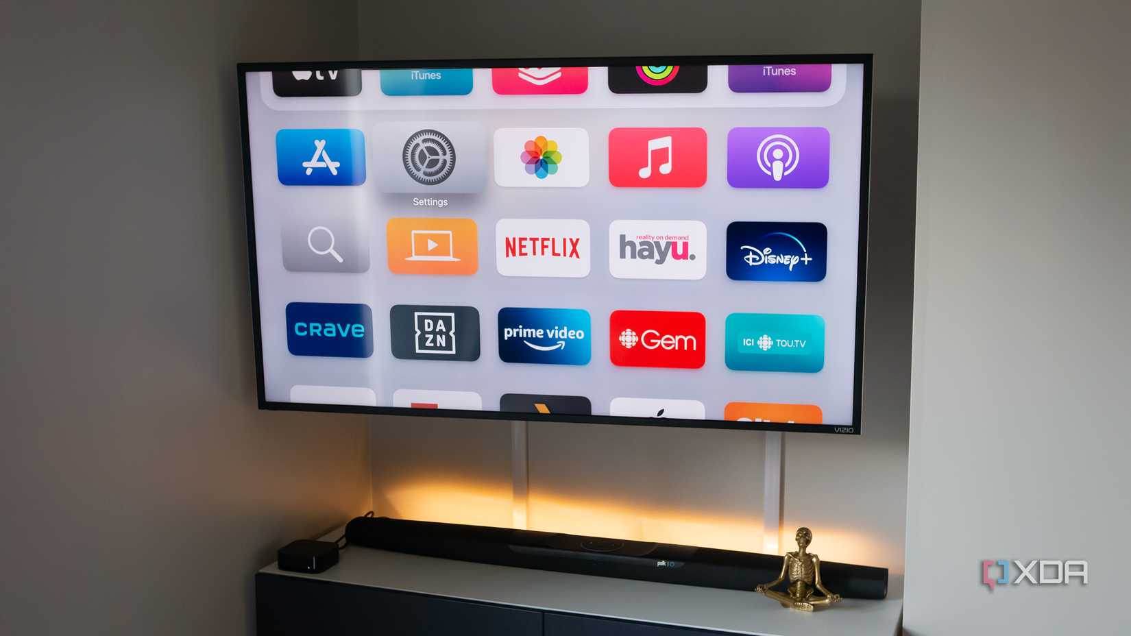 The Apple TV's home menu on a Hisense TV