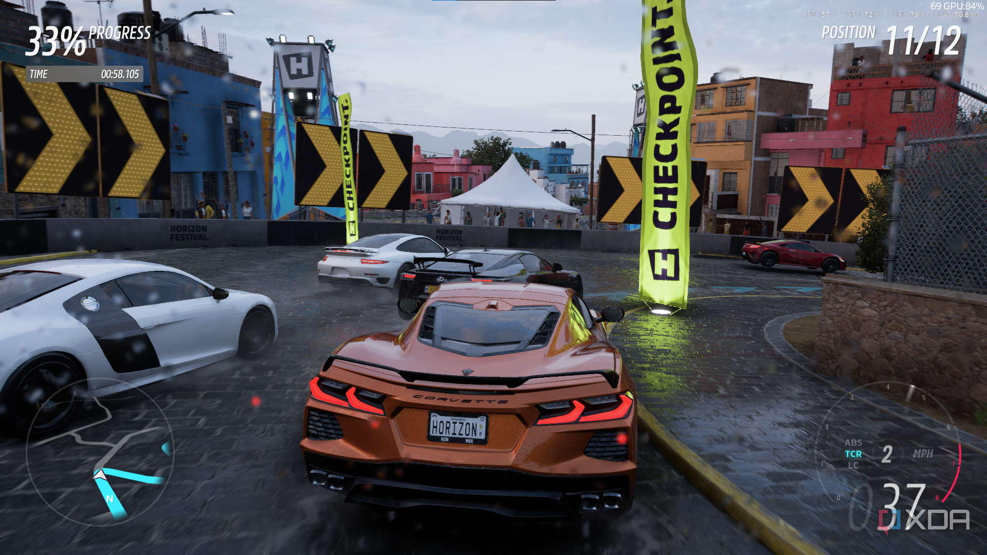 A still from Forza Horizon 5 with a Chevrolet Corvette executing a corner overtake.