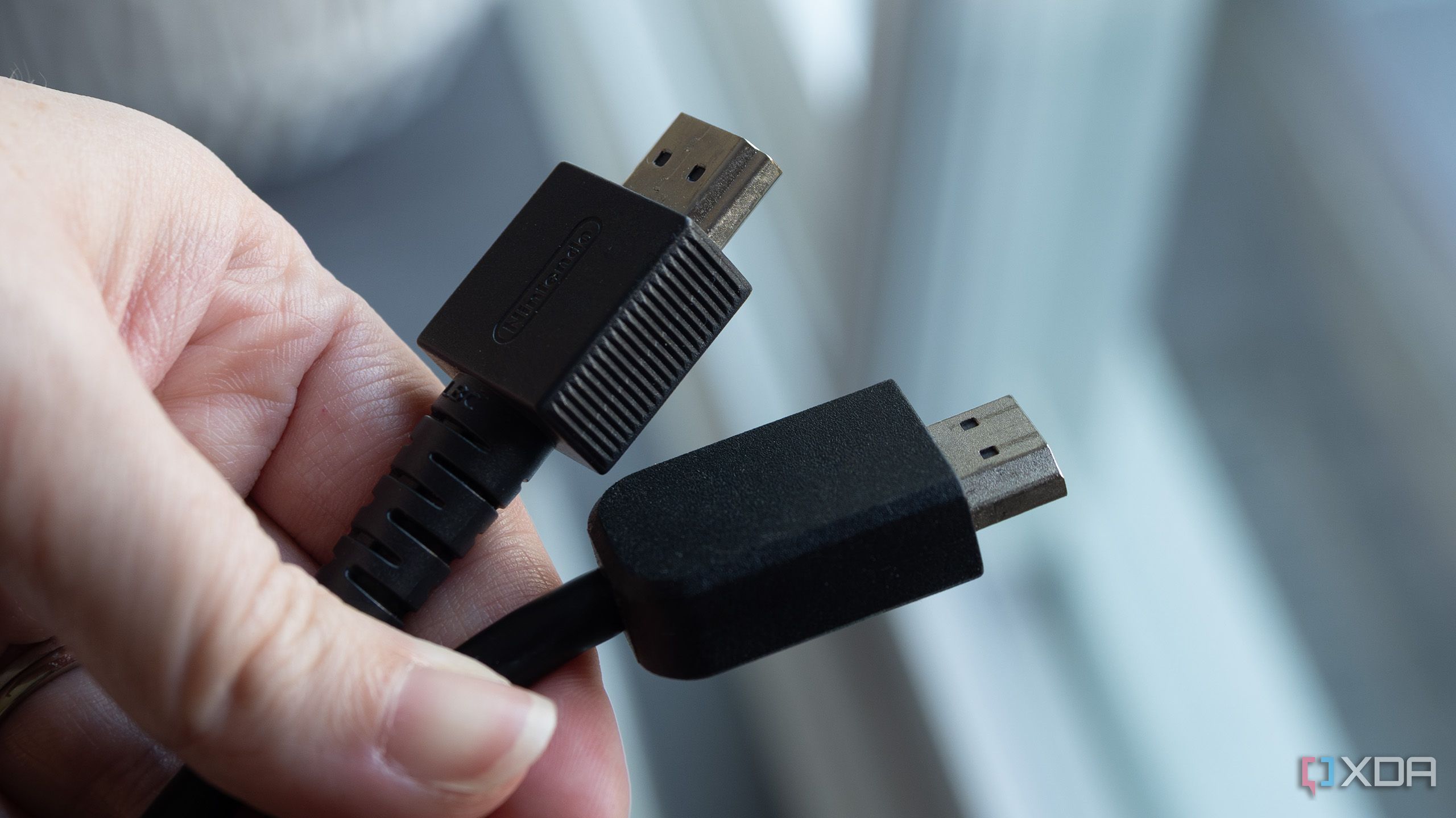 HDMI cables being held 