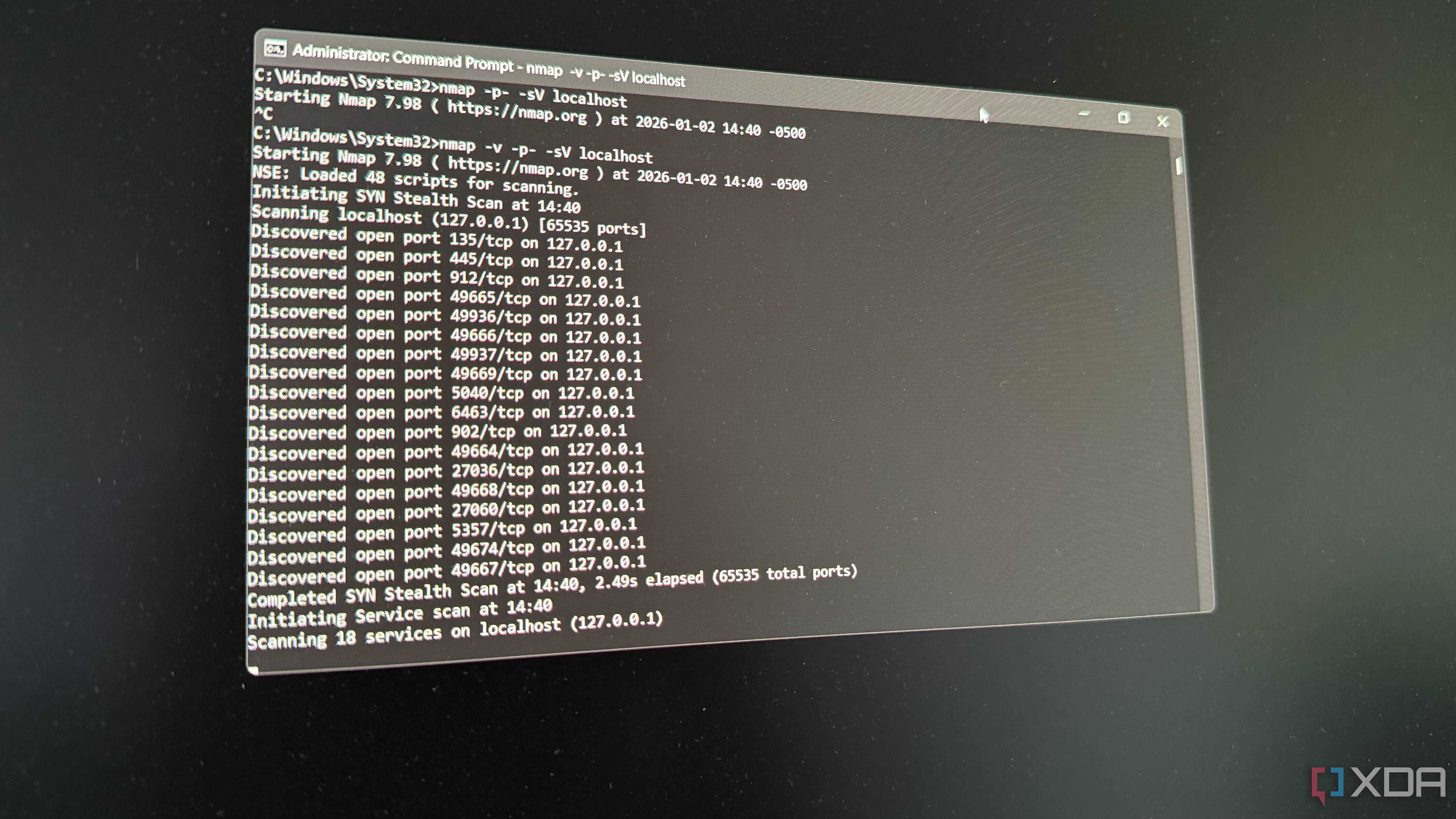 A photo of a cmd window showing nmap running