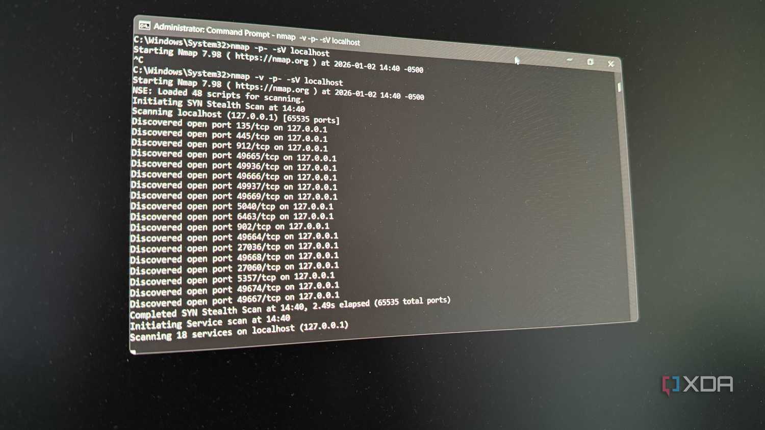 A photo of a cmd window showing nmap running