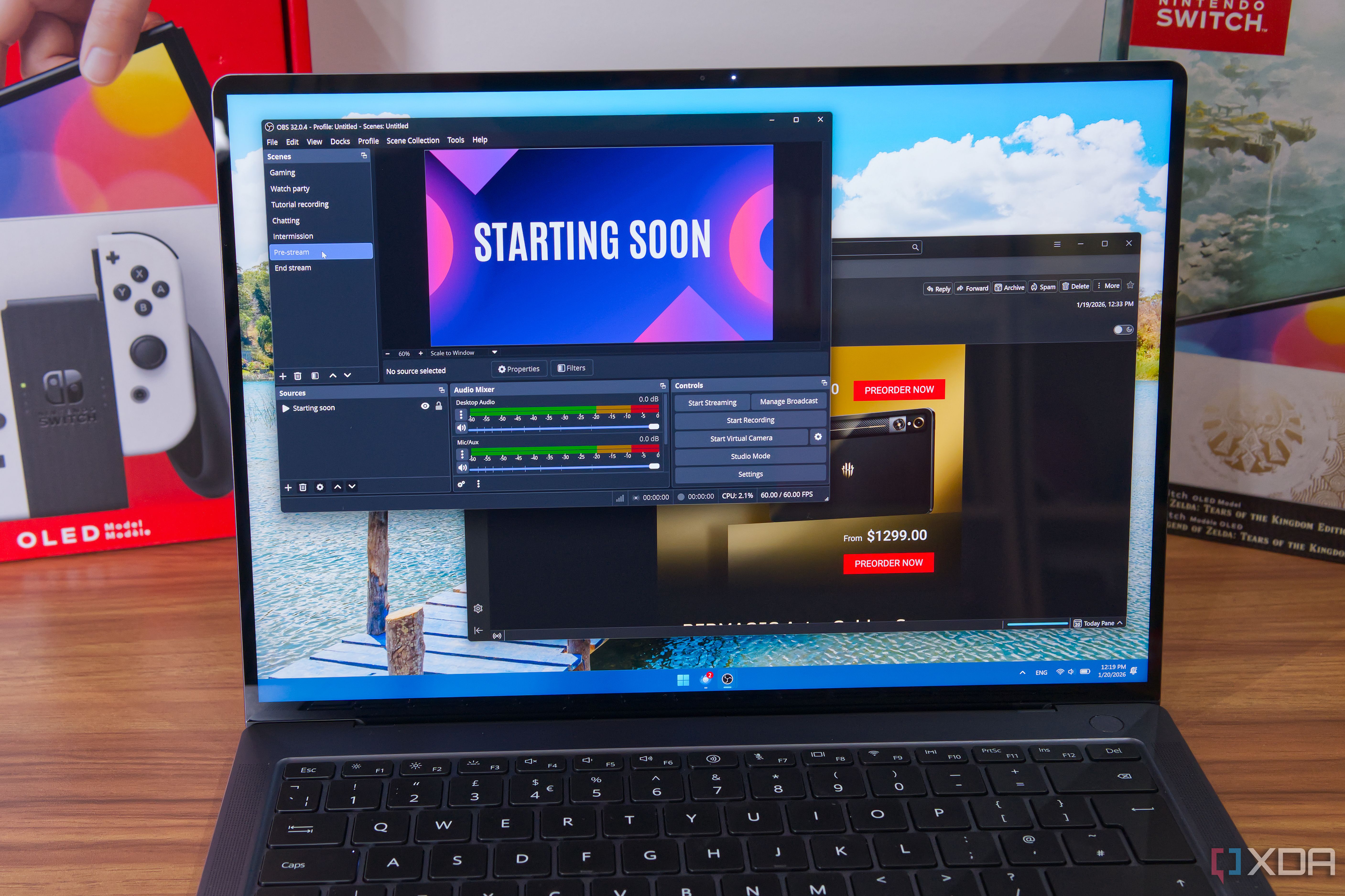 A Windows 11 laptop running Mozilla Thunderbird and OBS Studio