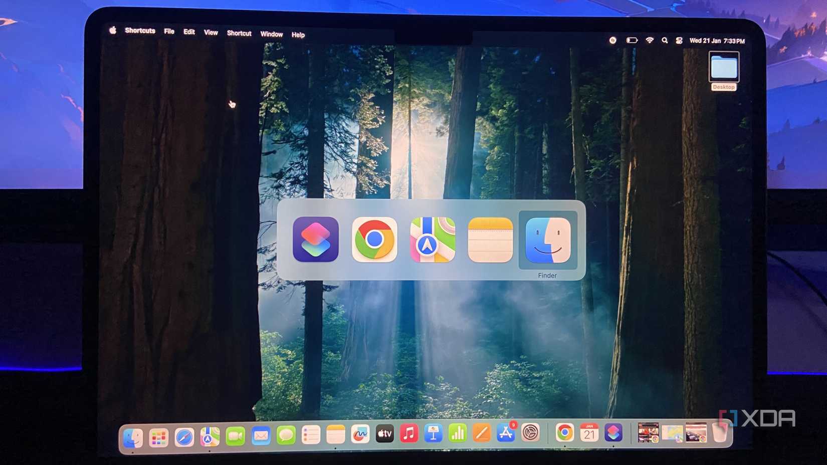 An image of a macbook air displaying its window management toggle.