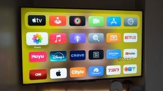 The Apple TV's home screen in a dark room