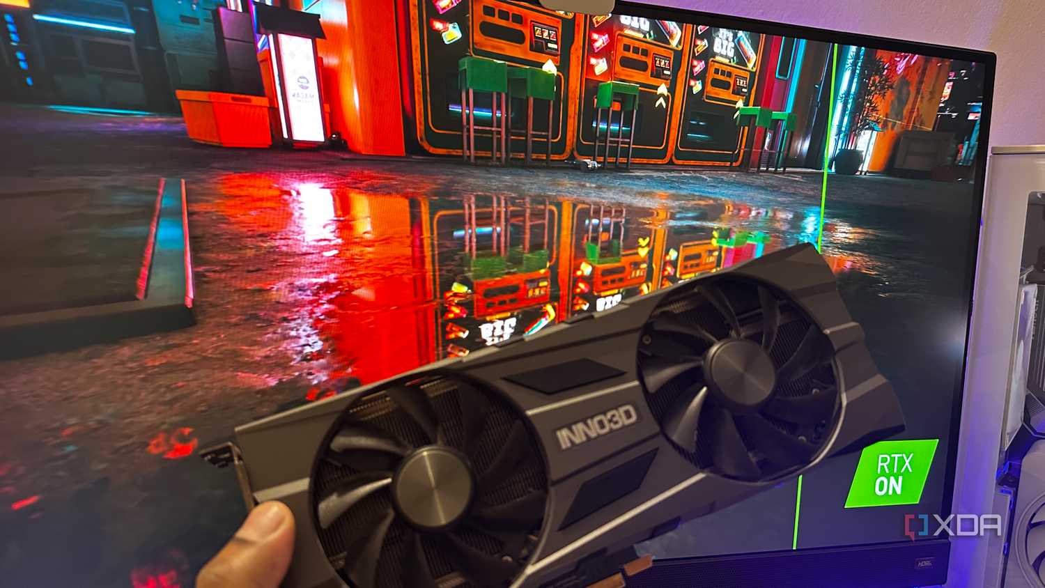 RTX On background with an RTX 2070 Super being held.