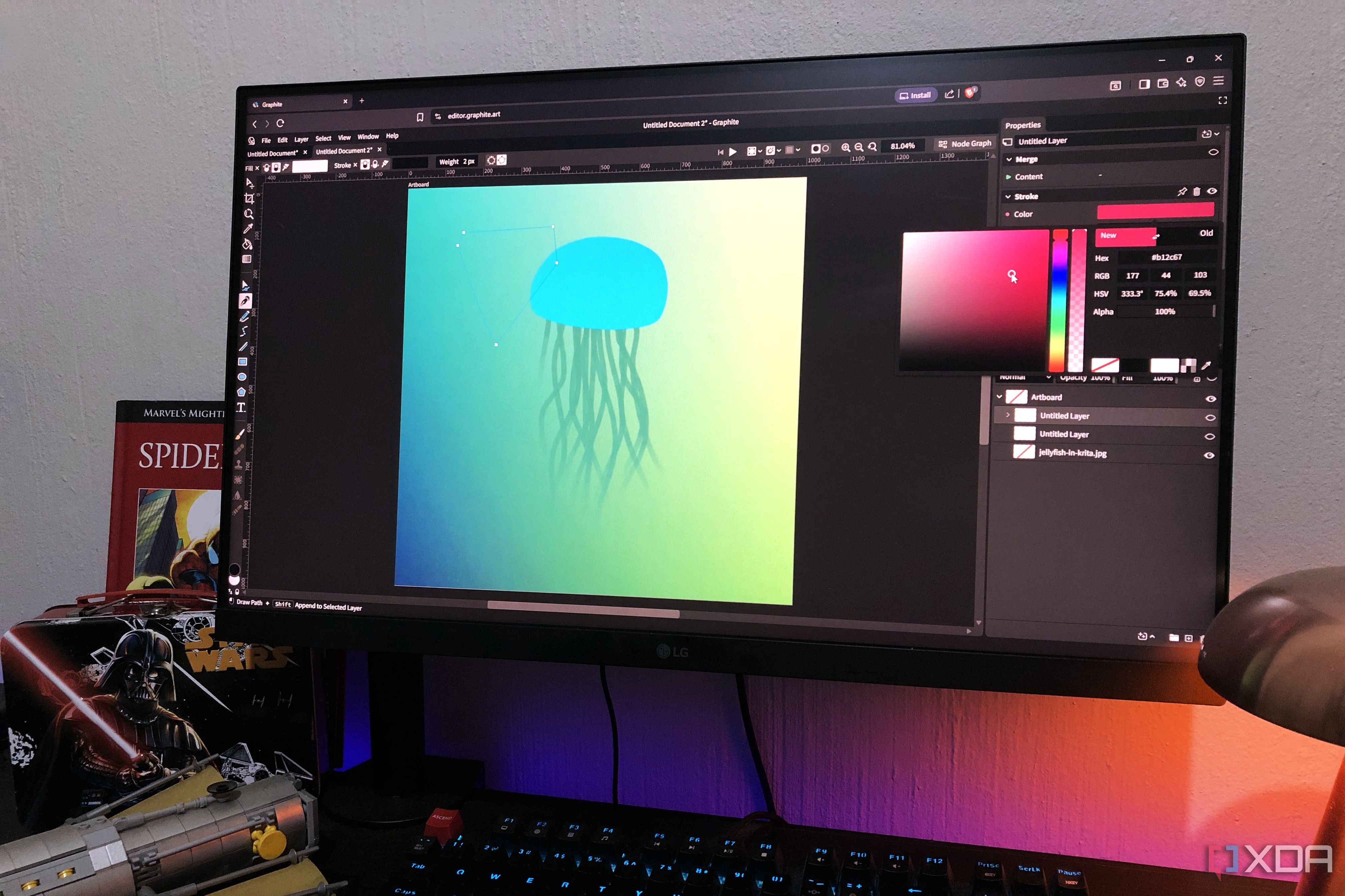 Graphite on desktop pc, lamp and lego in view