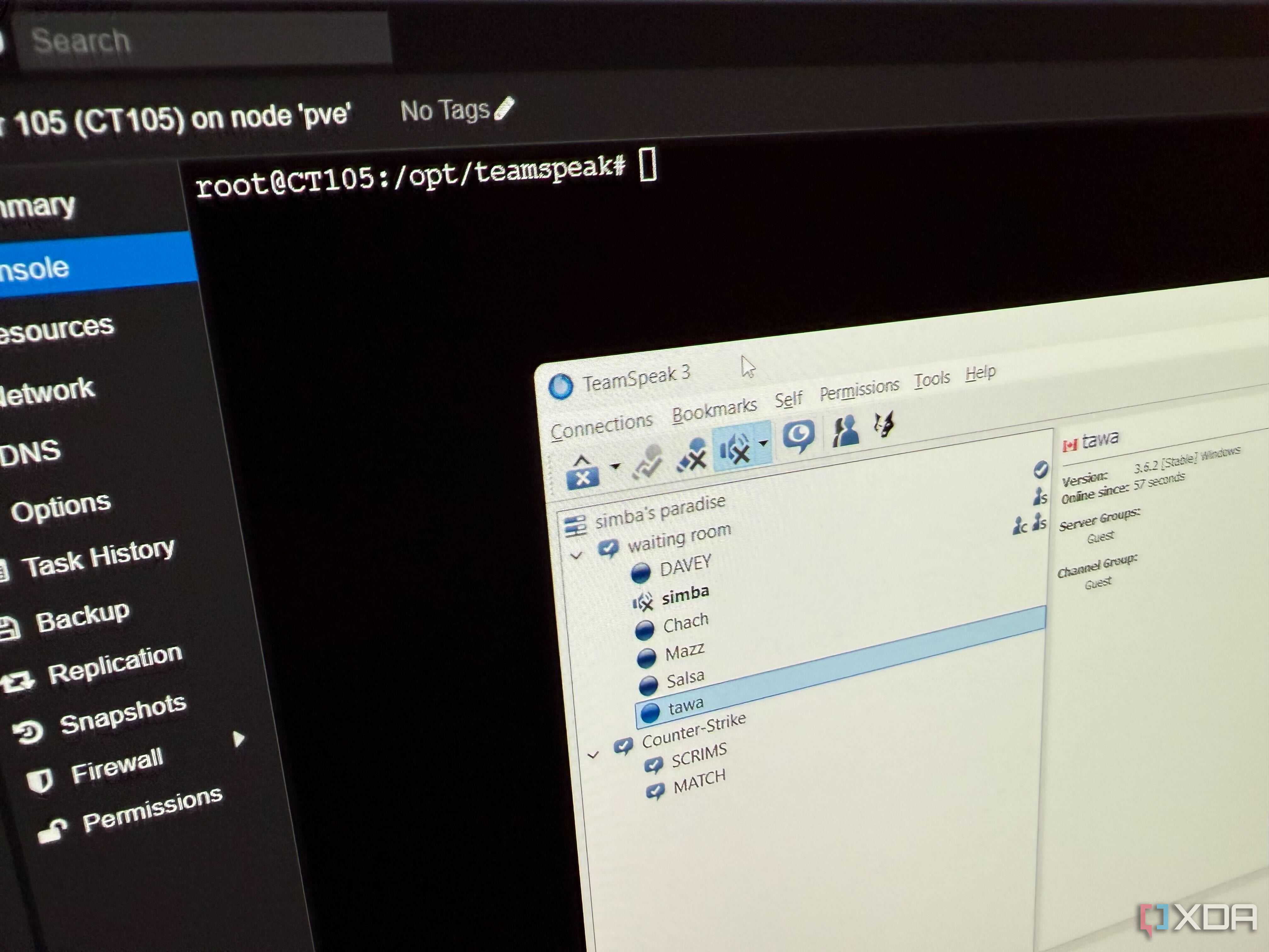 A photo of a monitor showing a proxmox node running a teamspeak server, with a teamspeak 3 client running
