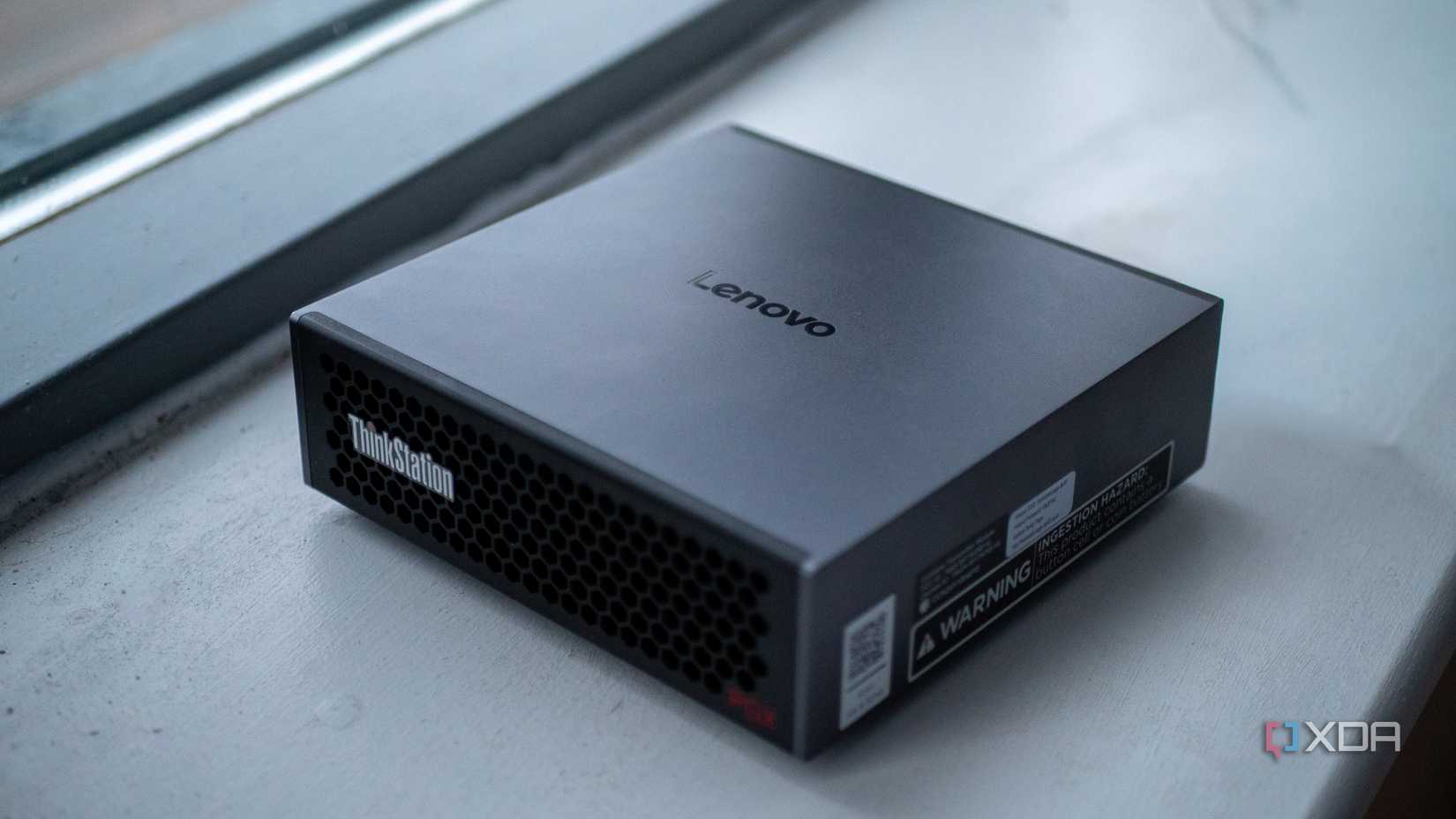 Lenovo Thinkstation PGX on a windowsill, showing the Lenovo logo