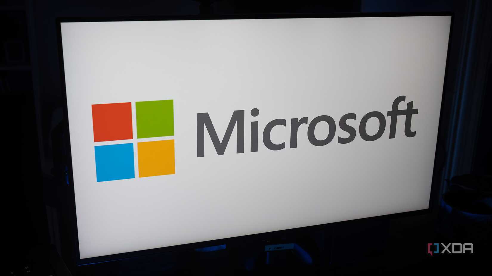 Microsoft's logo in a dark room