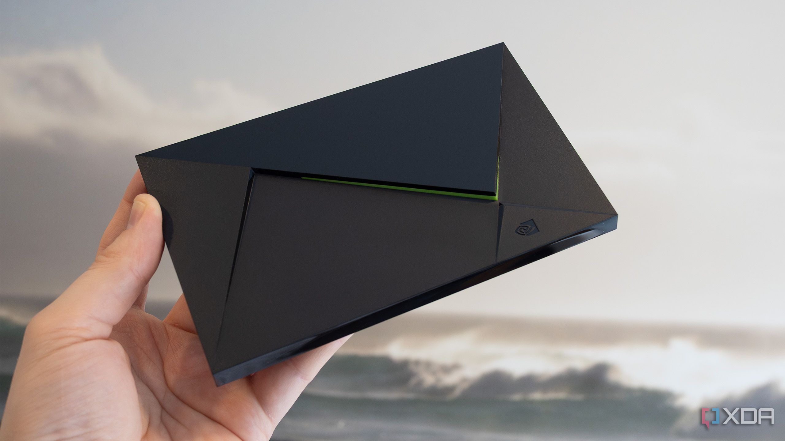The Nvidia Shield TV Pro being held