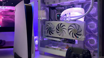 A PS5 next to a gaming PC.