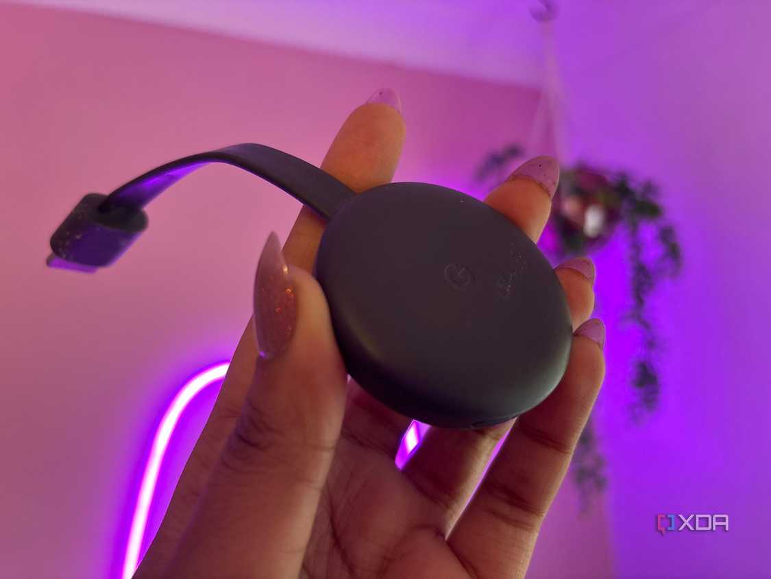 Chromecast in front of pink wall