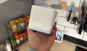 Mercusys mesh wifi system node in kitchen with kitchen counter in background