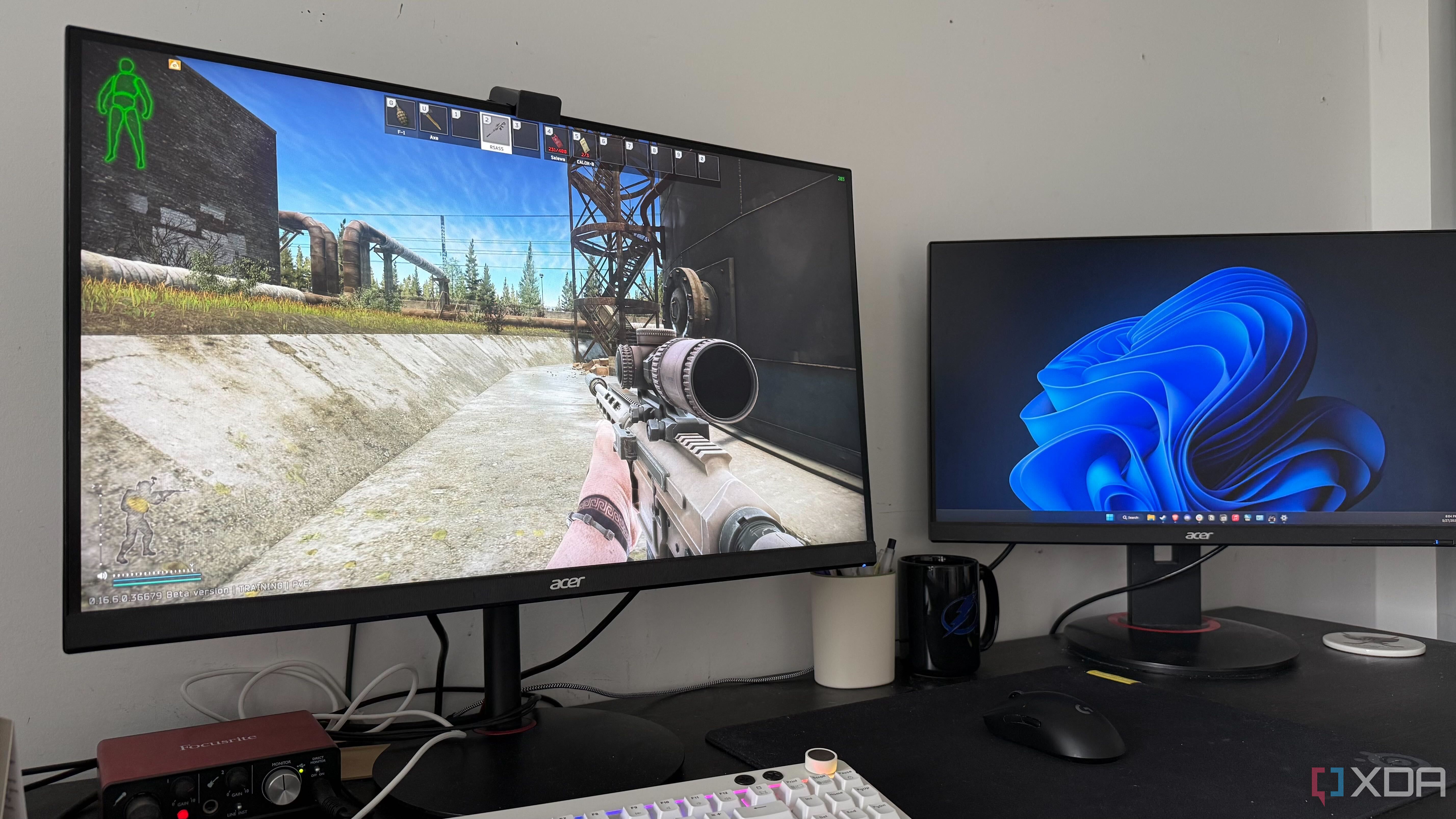 A photo of a gaming pc running Windows 11 and Tarkov