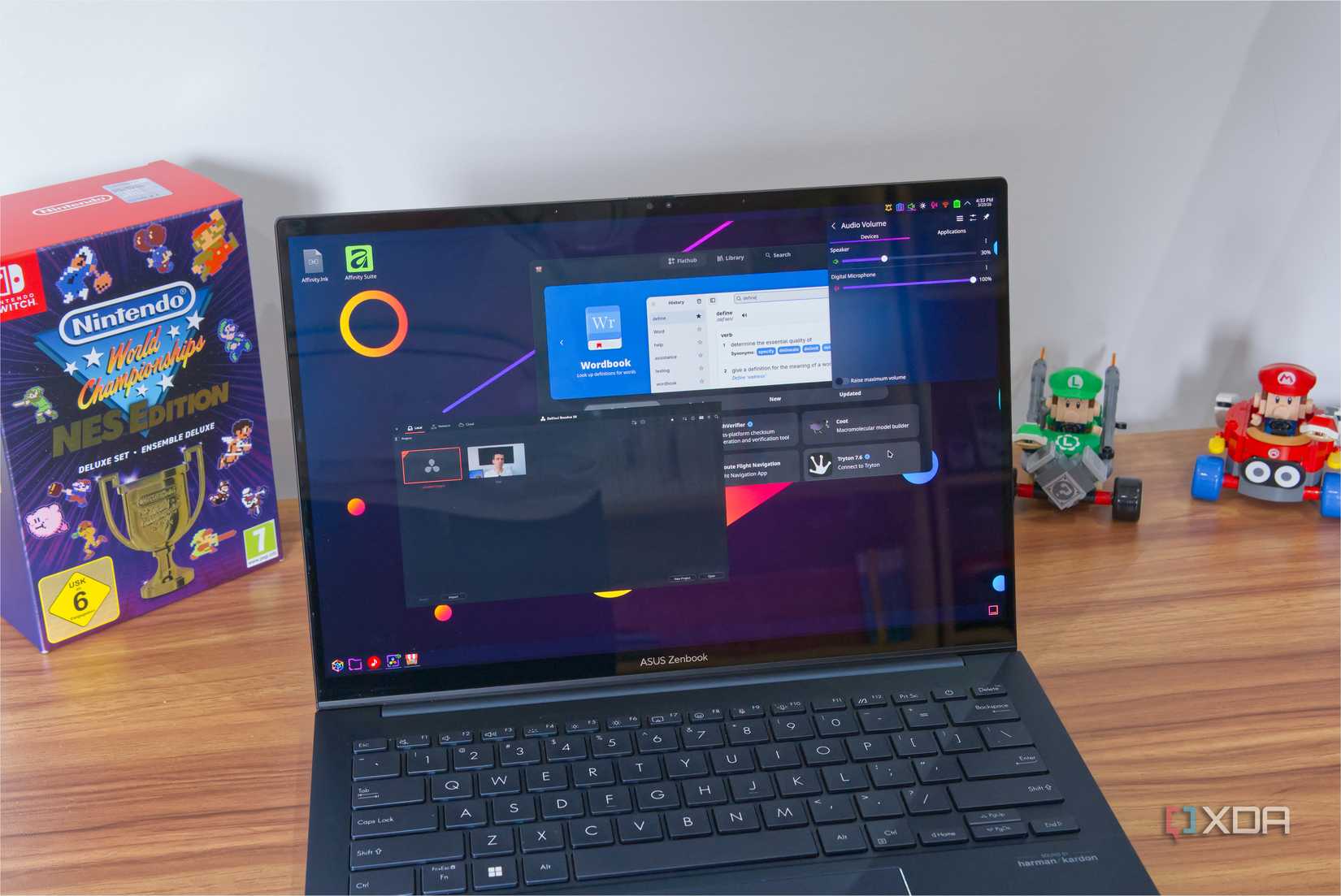 A laptop showing a KDE Plasma desktop with DaVinci Resolve and Bazaar open