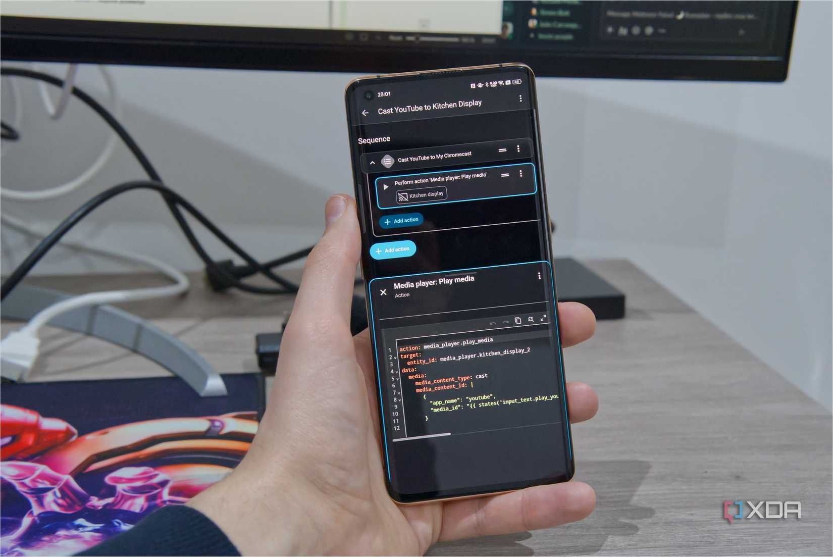 A phone showing a screen of Home Assistant editing a script in YAML