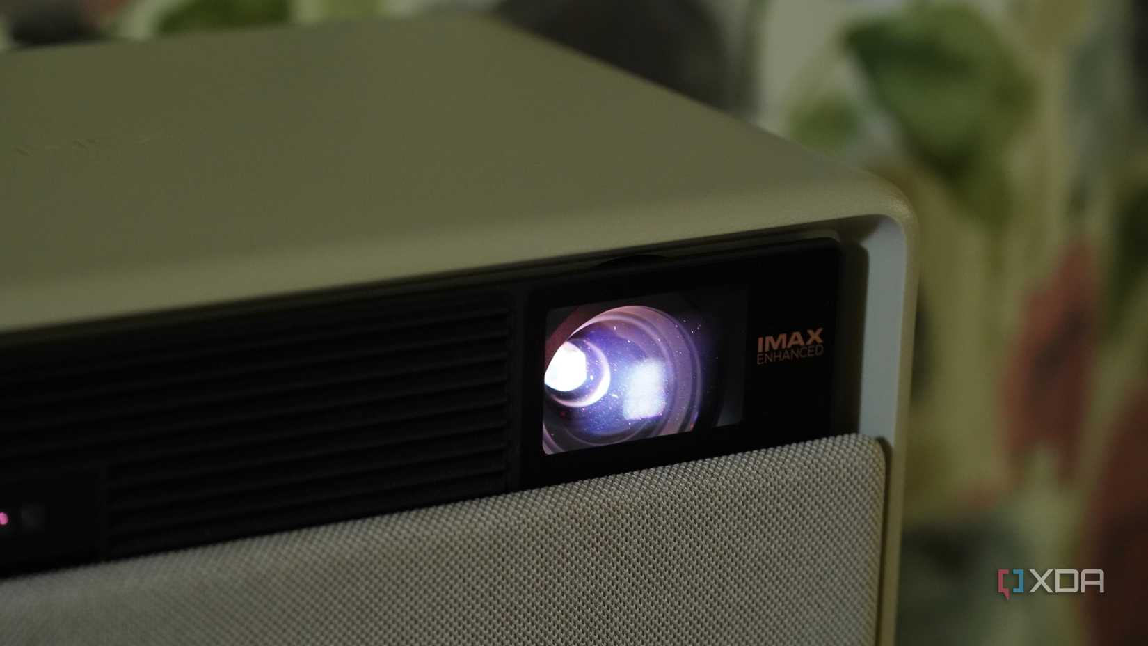 Projector lens with IMAX Enhanced branding