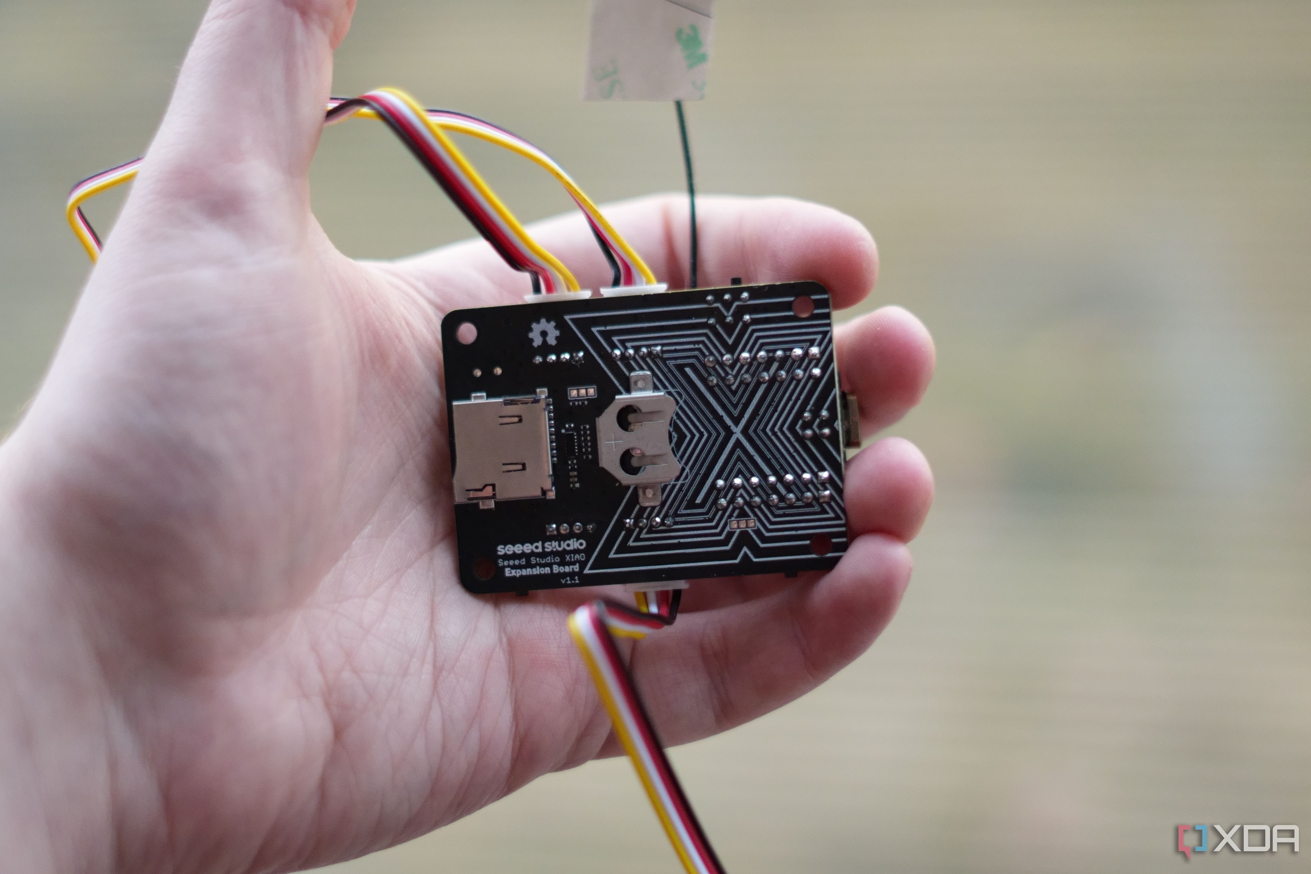 I built a gesture-controlled desk buddy with an $8 ESP32 and Grove sensors