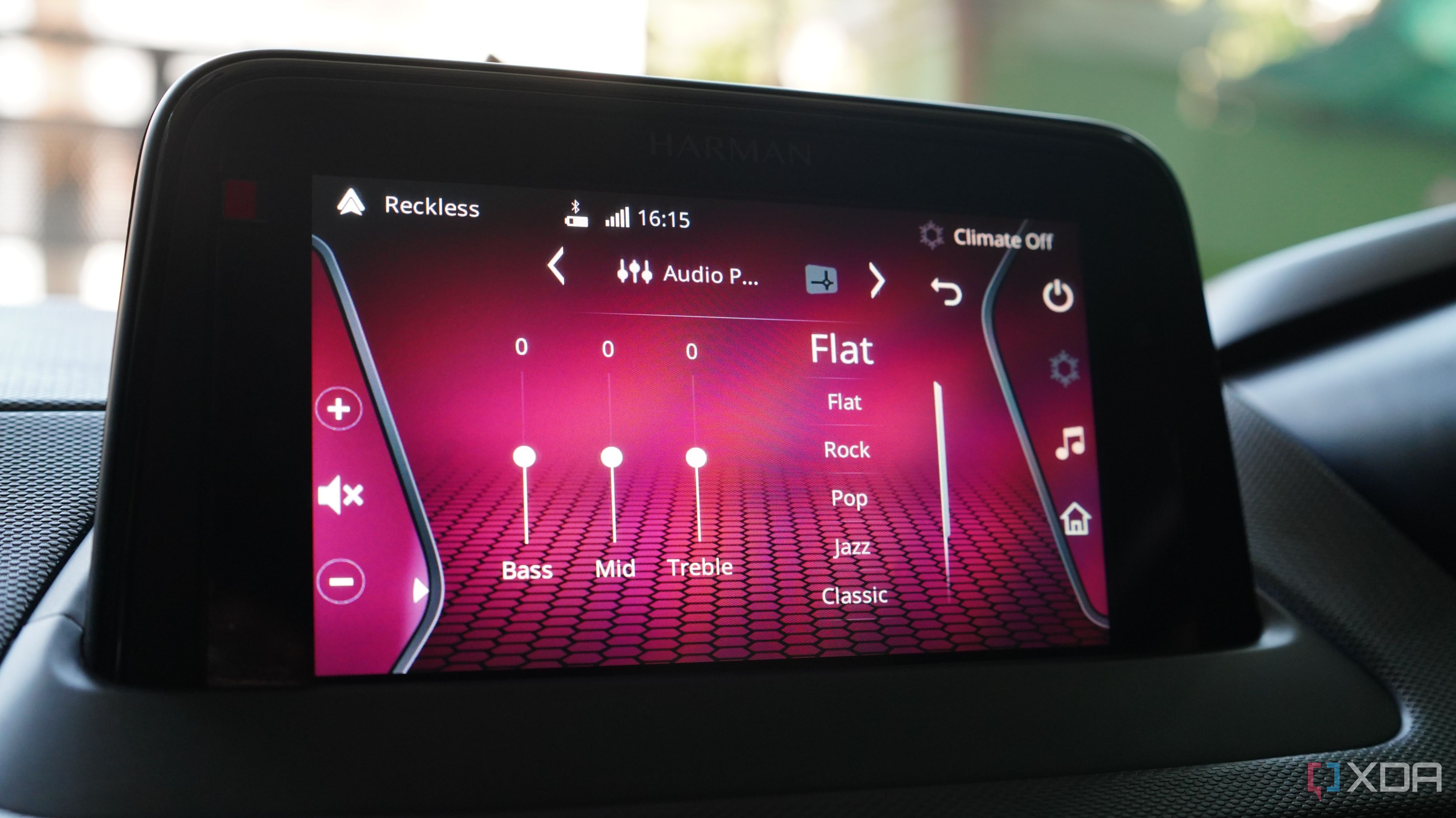 Adjusting the Audio equalizer to the Flat preset on a car infotainment display