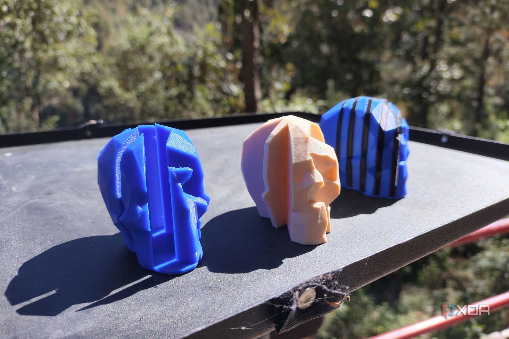 Как сократить расход филамента при многоцветной 3D-печати Различные детали моделей, напечатанные с использованием смены цветов