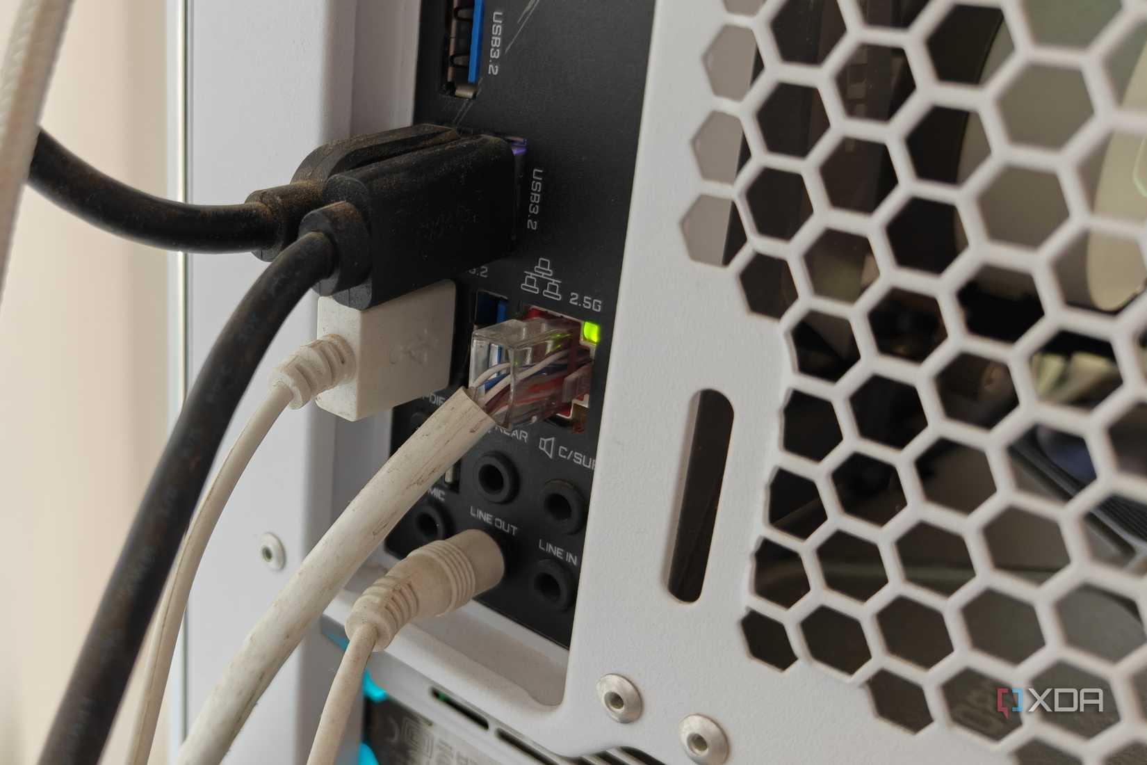 Close-up of an Ethernet cable connected to a 2.5GbE port on the motherboard