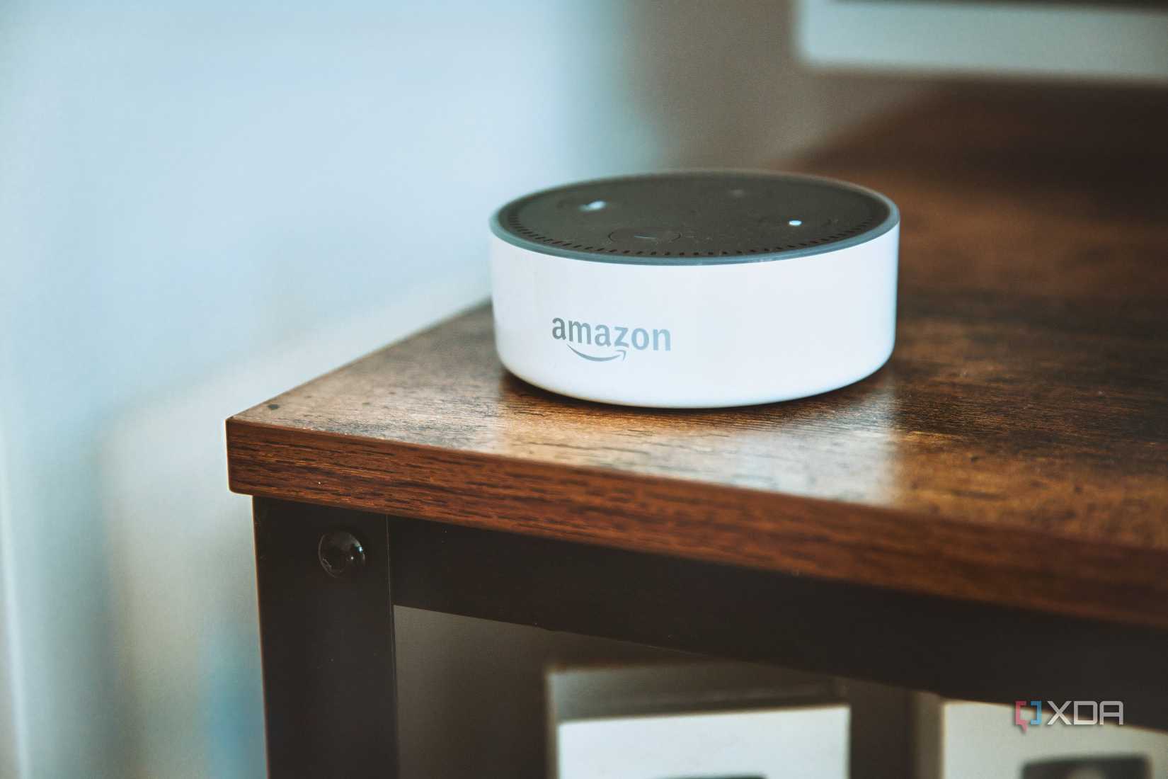 A white second-generation Amazon Echo Dot smart speaker