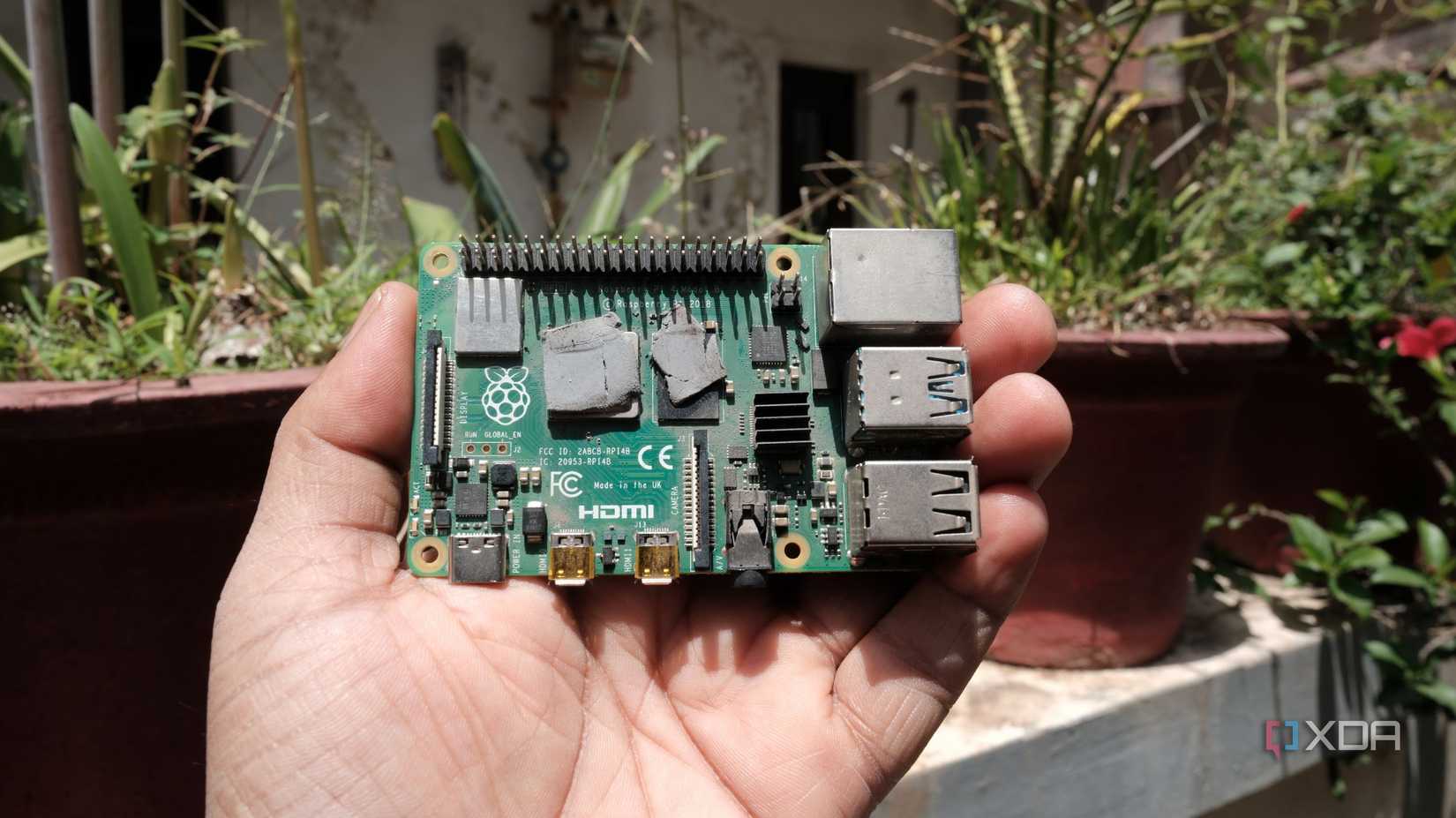 Holding the Raspberry Pi 4 in hand