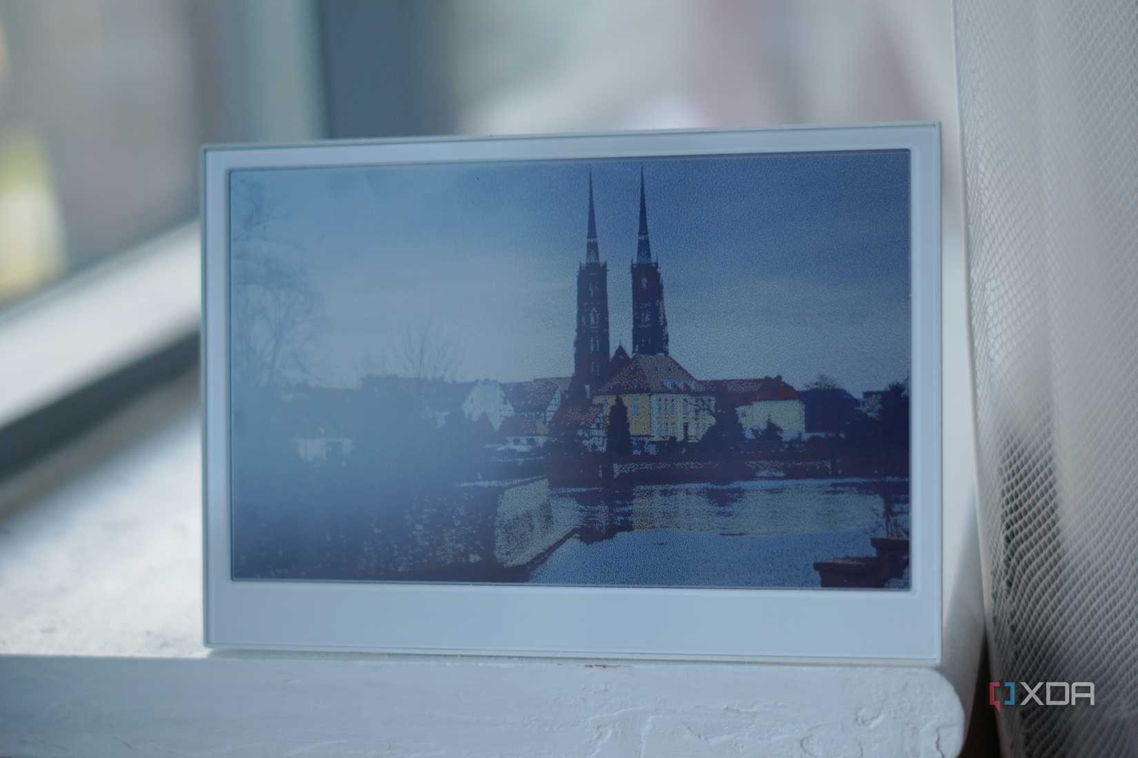 reTerminal E1002 showing a photo while on a window sill