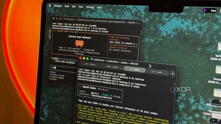 terminal window with code and build output on dark monitor with neon orange lighting