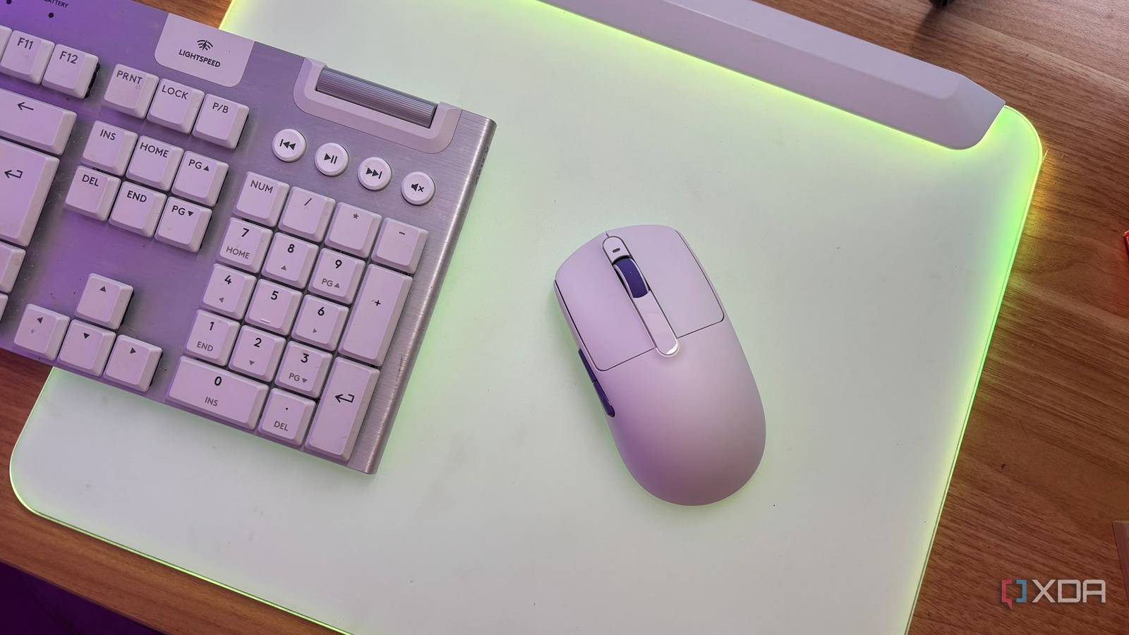 Akko Dash Ultra (V9) on light up mouse pad with keyboard next to it