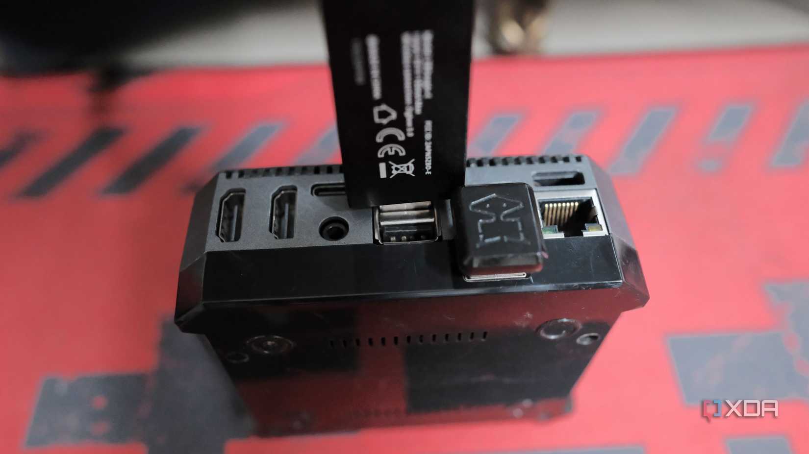 Zigbee Coordinator USB dongle plugged into a tight port on Raspberry Pi