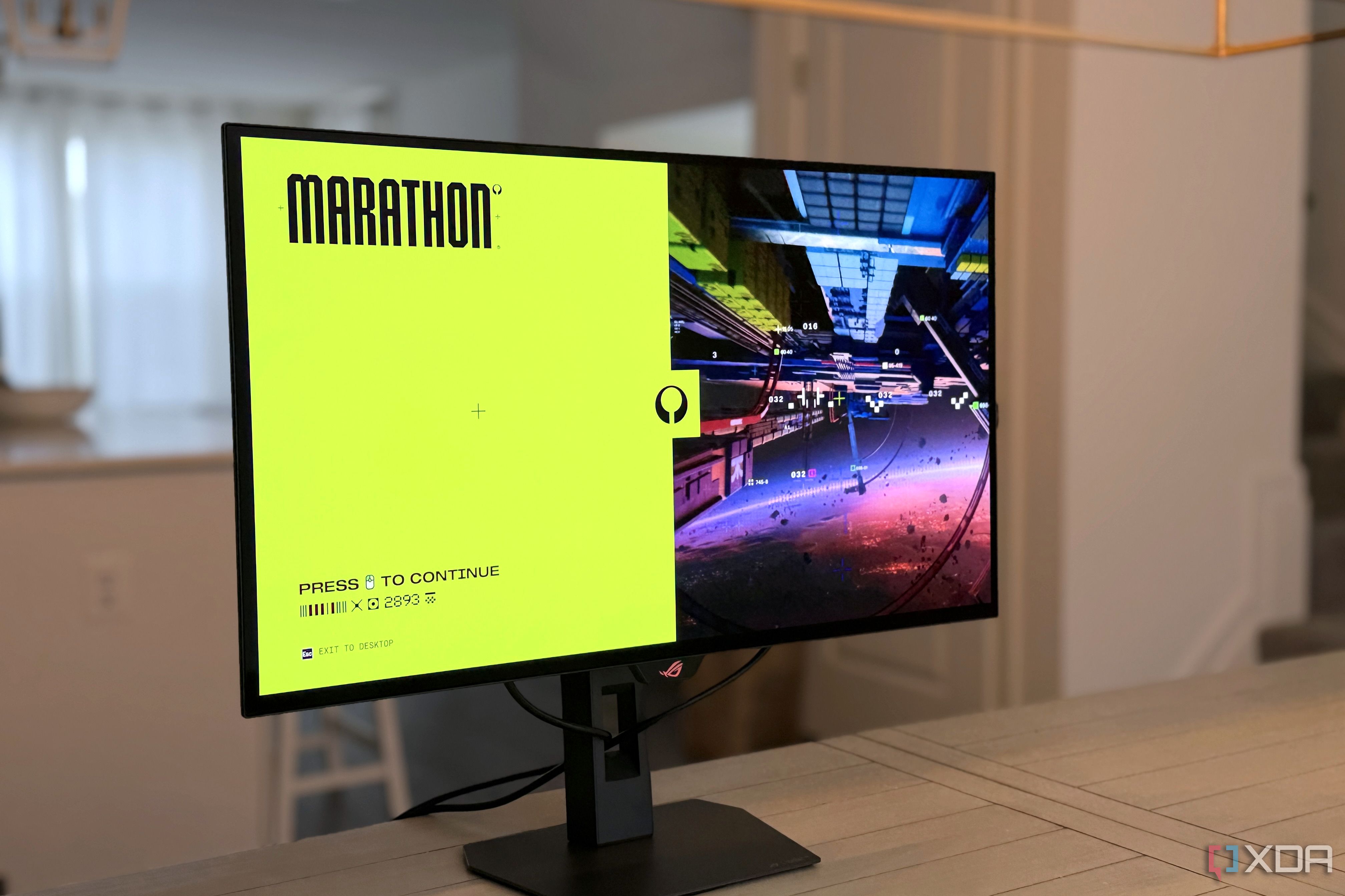 asus rog strix xg27aqwmg marathon showing start screen