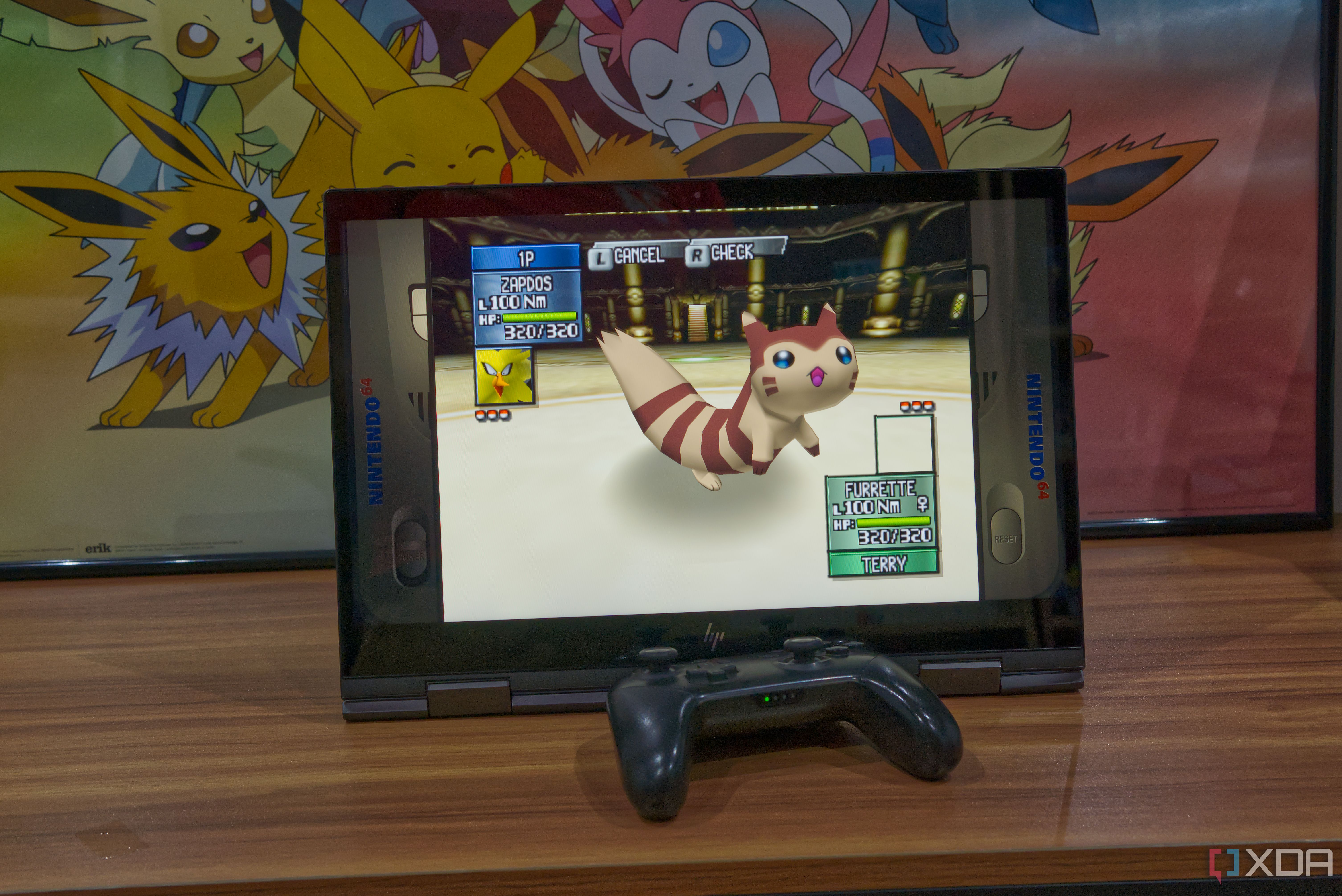 A laptop running Pokémon Stadium 2 in Batocera