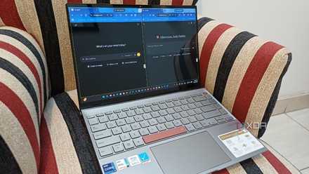 A laptop on a chair with strips with a laptop on it with Claude and ChatGPT in split-screen mode