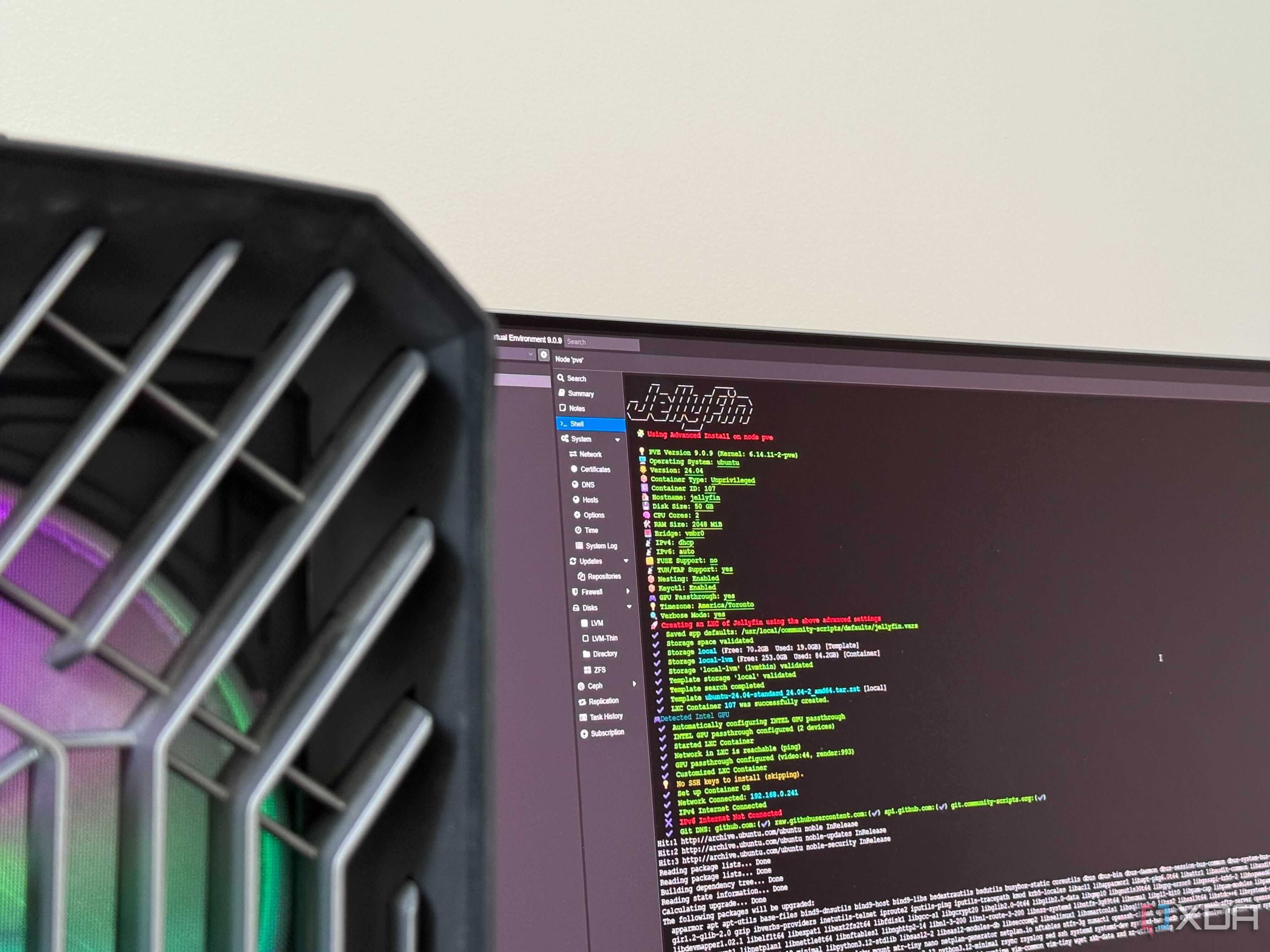 A photo of a monitor showing jellyfin's community script setup in a proxmox LXC