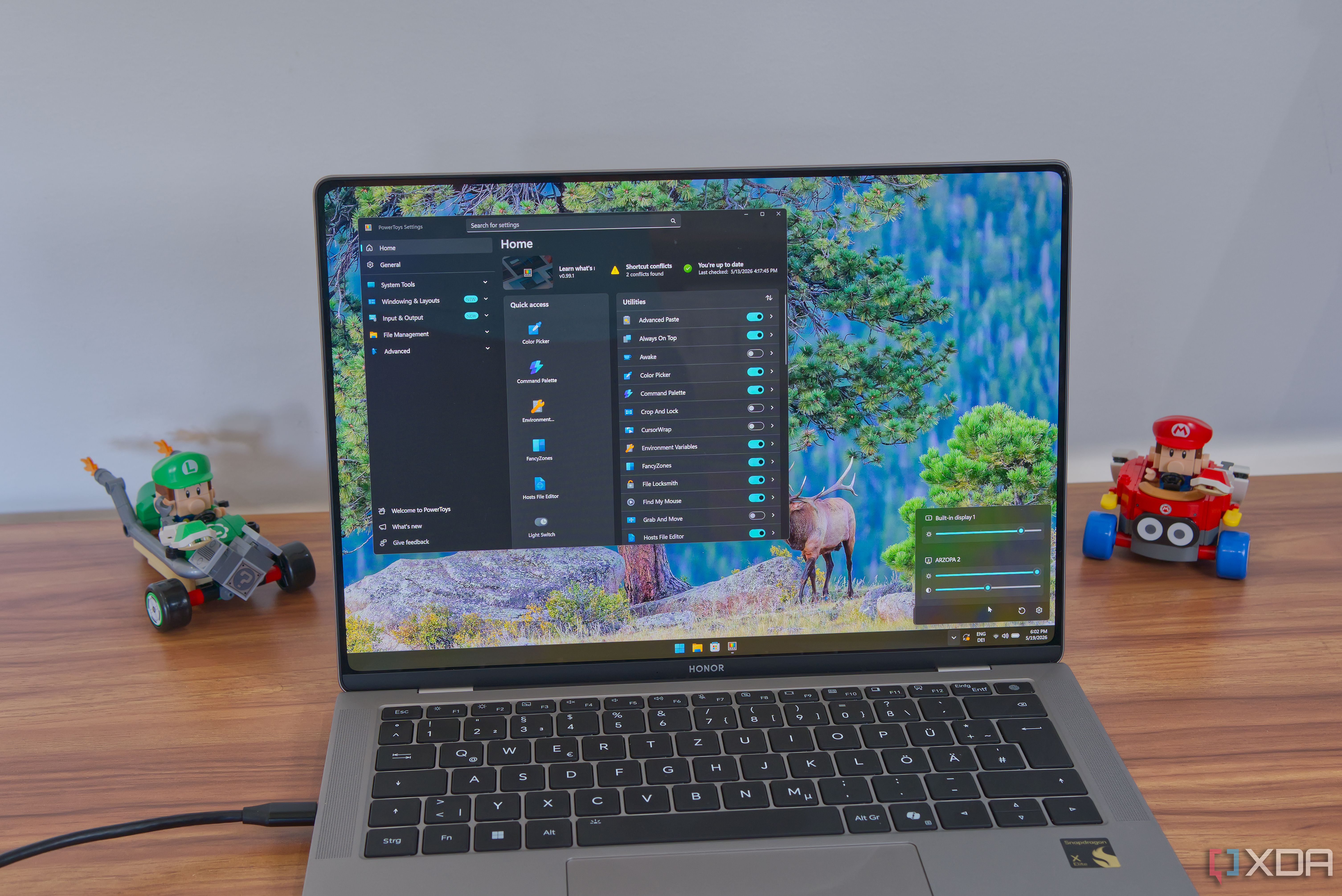A laptop running PowerToys and showing display controls enabled by Power Display