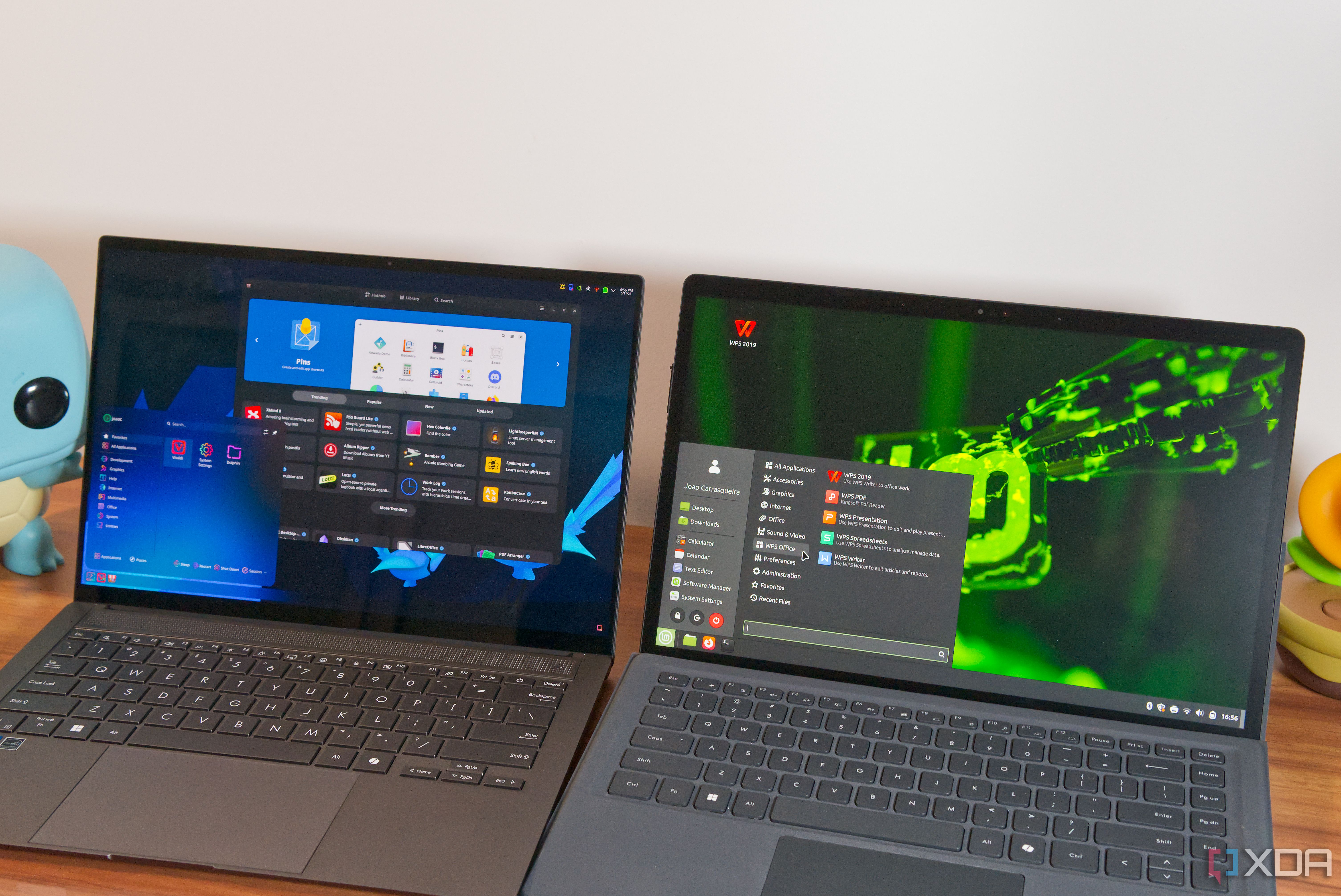 Two laptops showing the KDE Plasma and Cinnamon desktops