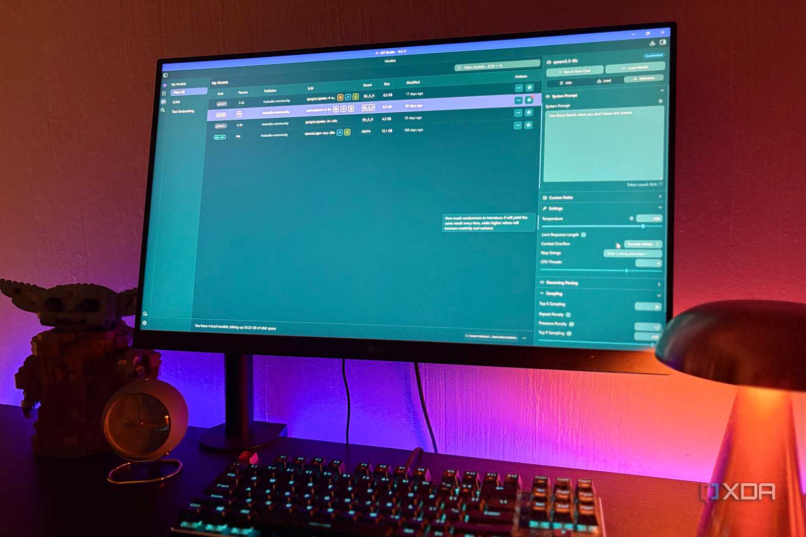 lm studio on desktop pc, lego and  lamp in view