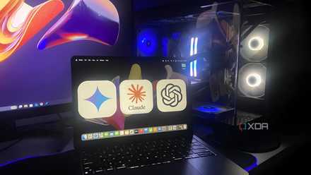 Claude, Chatgpt and Gemini logos on a MacBook Air M2. A PC can be seen in the background.