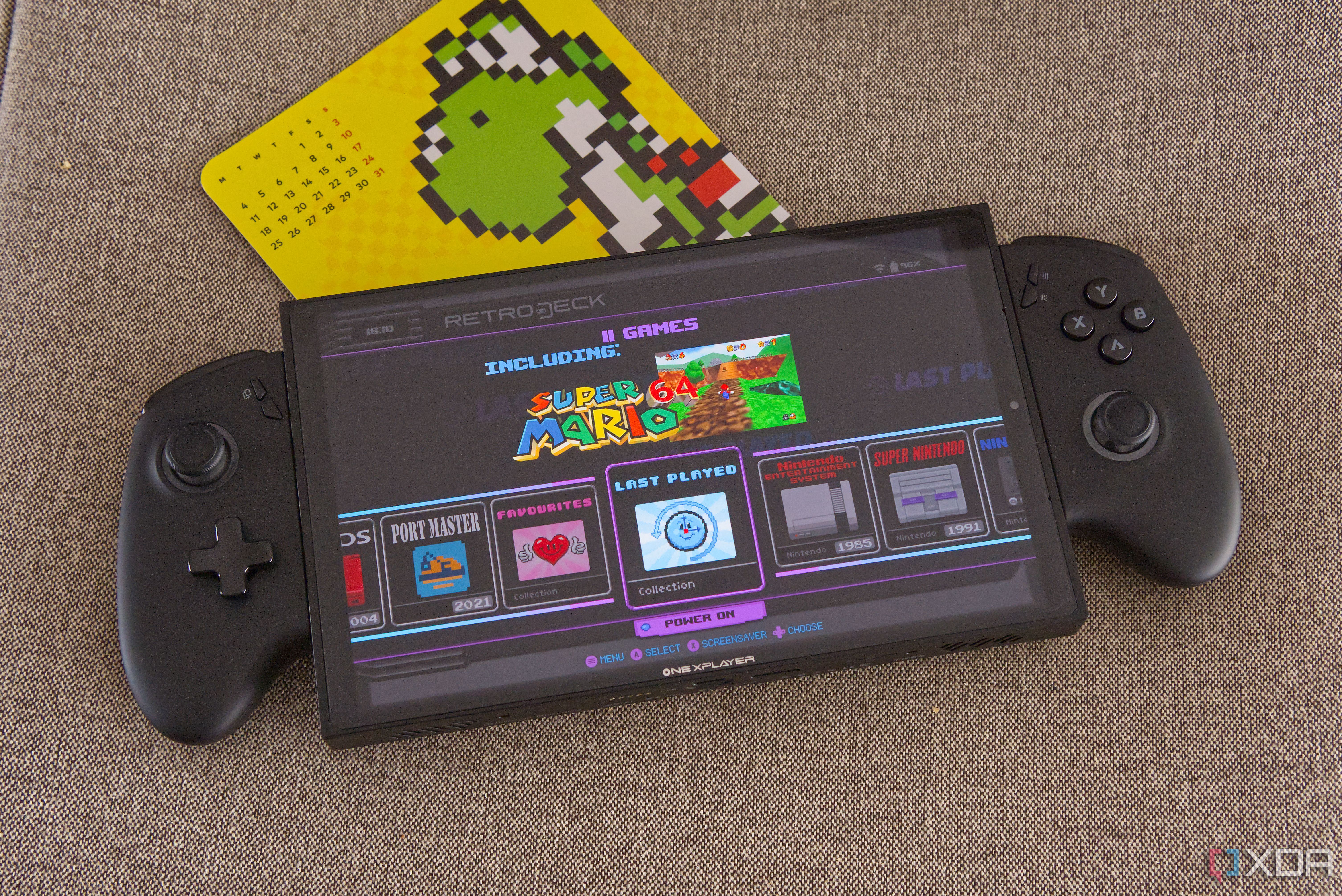 A gaming handheld running RetroDeck and ES-DE