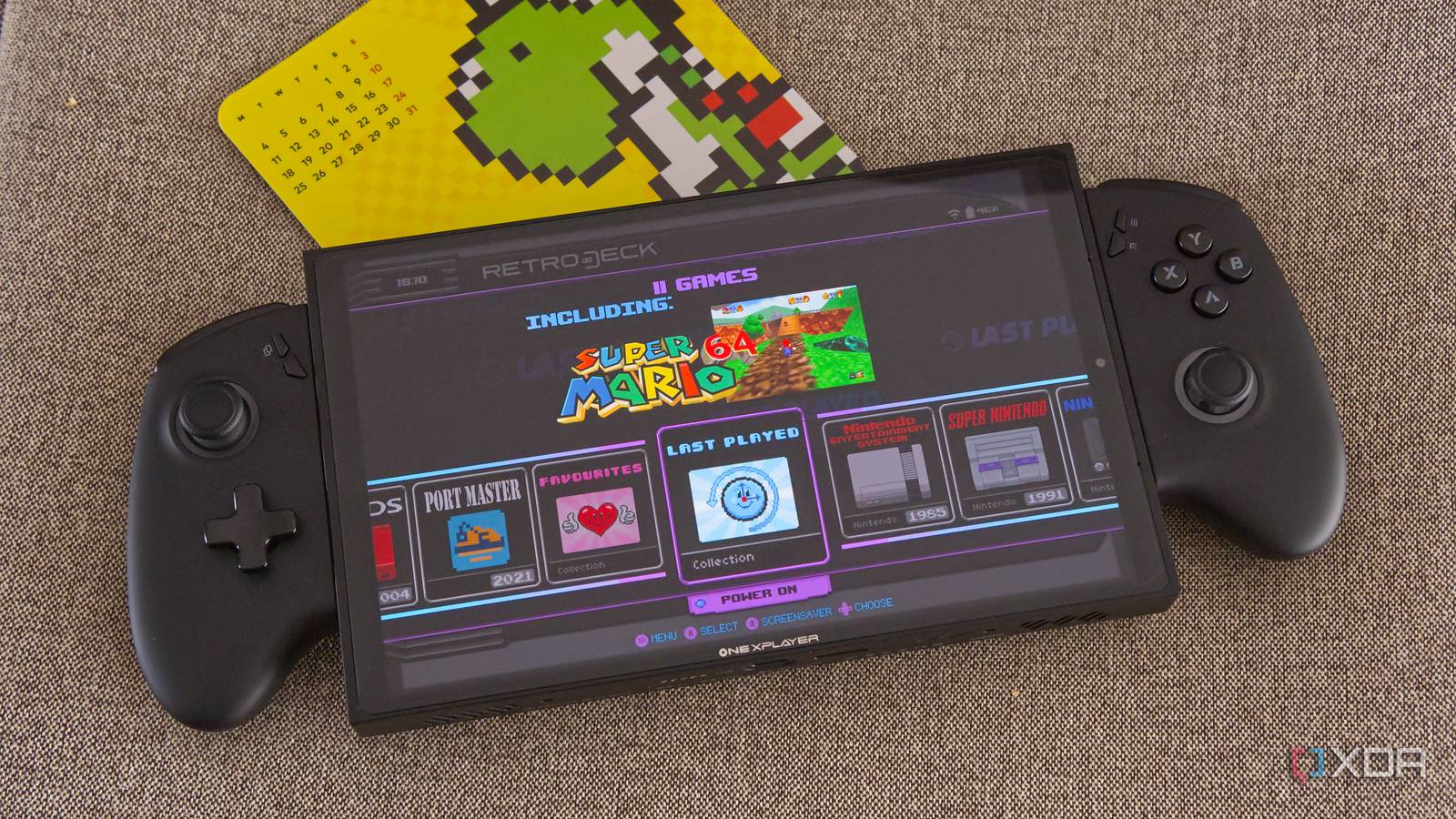 A gaming handheld running RetroDeck and ES-DE