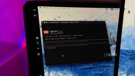 terminal window showing Claude's code on a Mac laptop with colorful purple and blue lighting