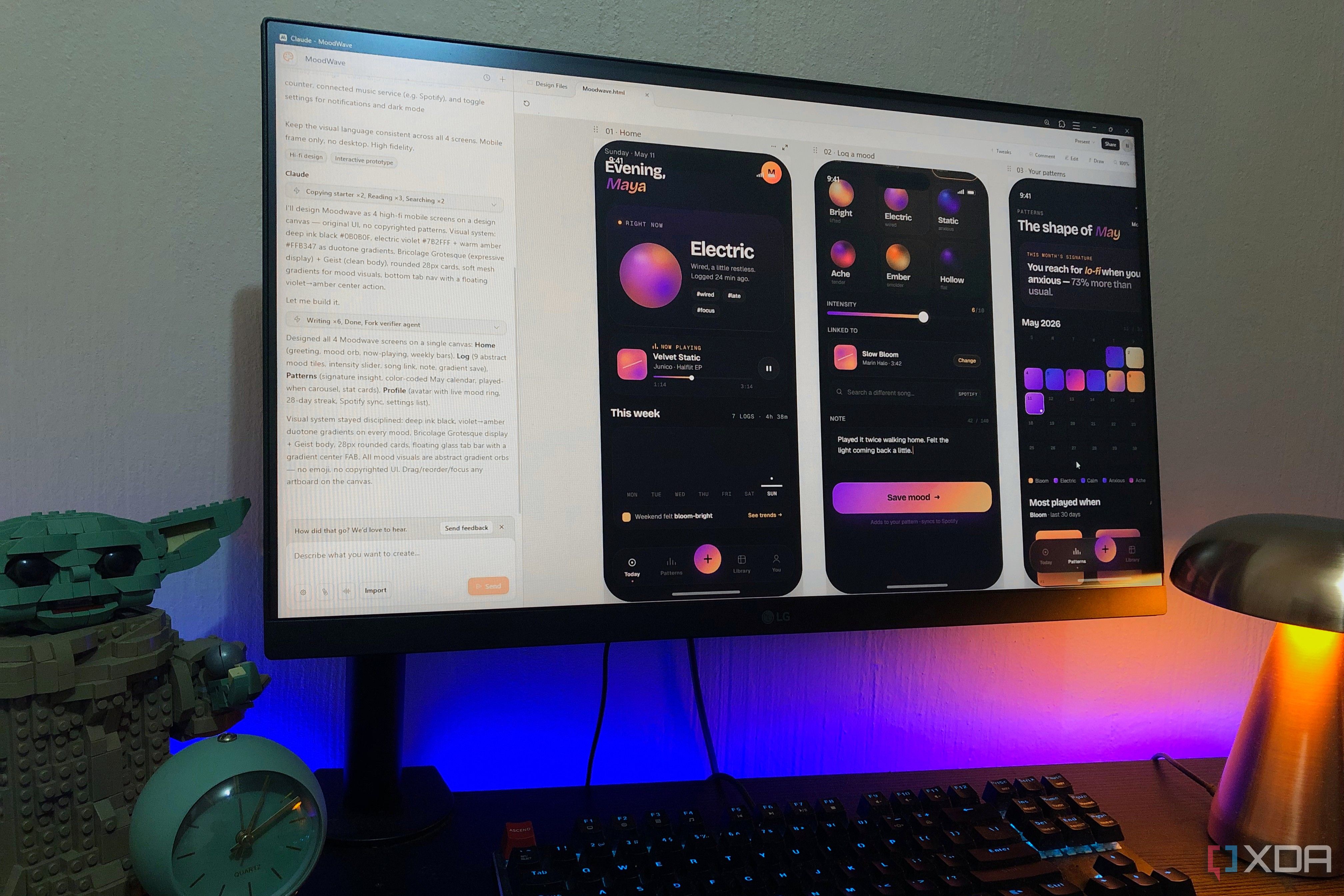 claude design vibe coding software on desktop computer with lego and lamp in view