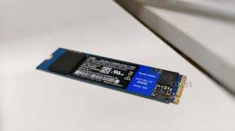 A blue SSD without a heatsink placed on a white desk