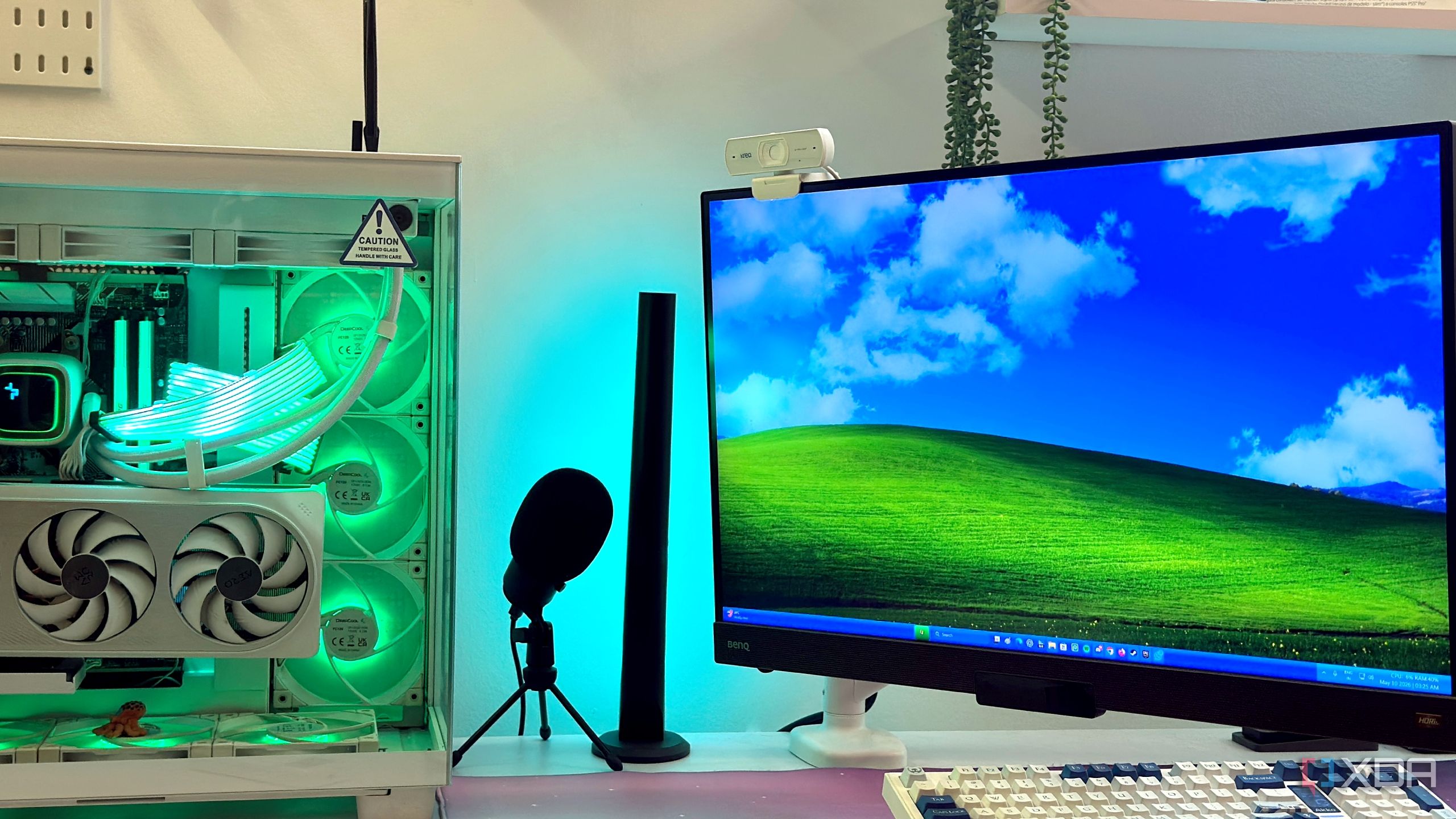 Windows XP background and taskbar in Windows 11 on a gaming PC.