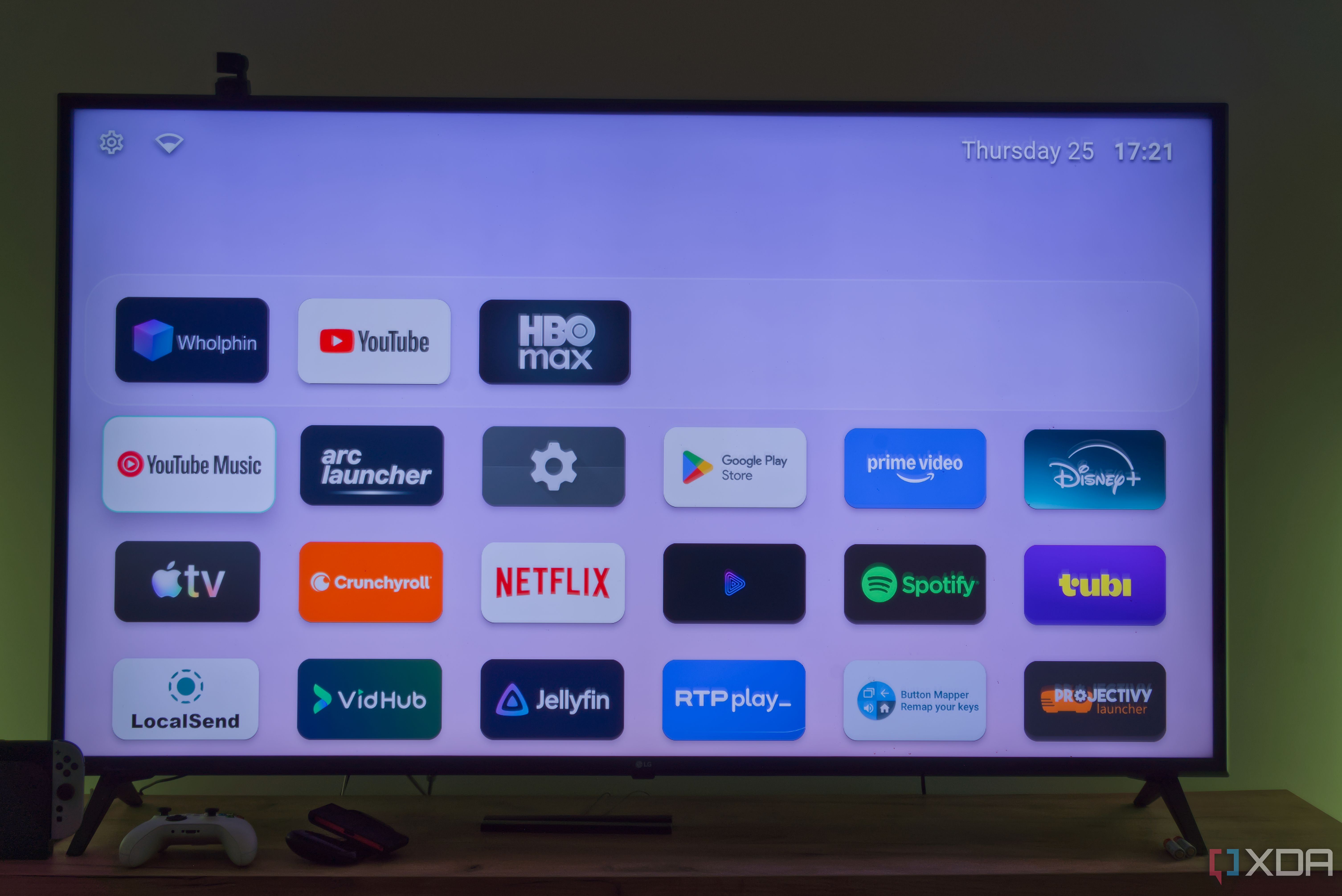 A TV displaying the Arc launcher app list